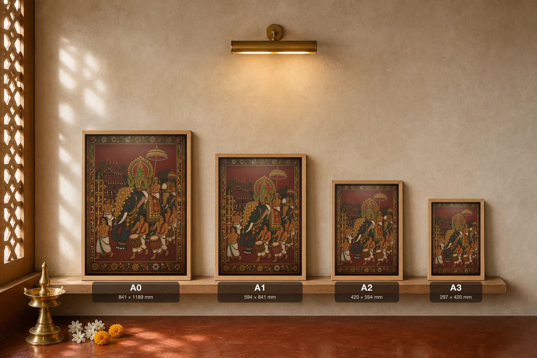Utsavam Temple Festival Night Kerala Mural Art Print — a deity carried on a caparisoned elephant by lamplight with drummers in panchavarna bhitti-chitra style · collector edition A2 — print size guide showing the artwork at A0, A1, A2 and A3 in natural-oak frames at true relative scale