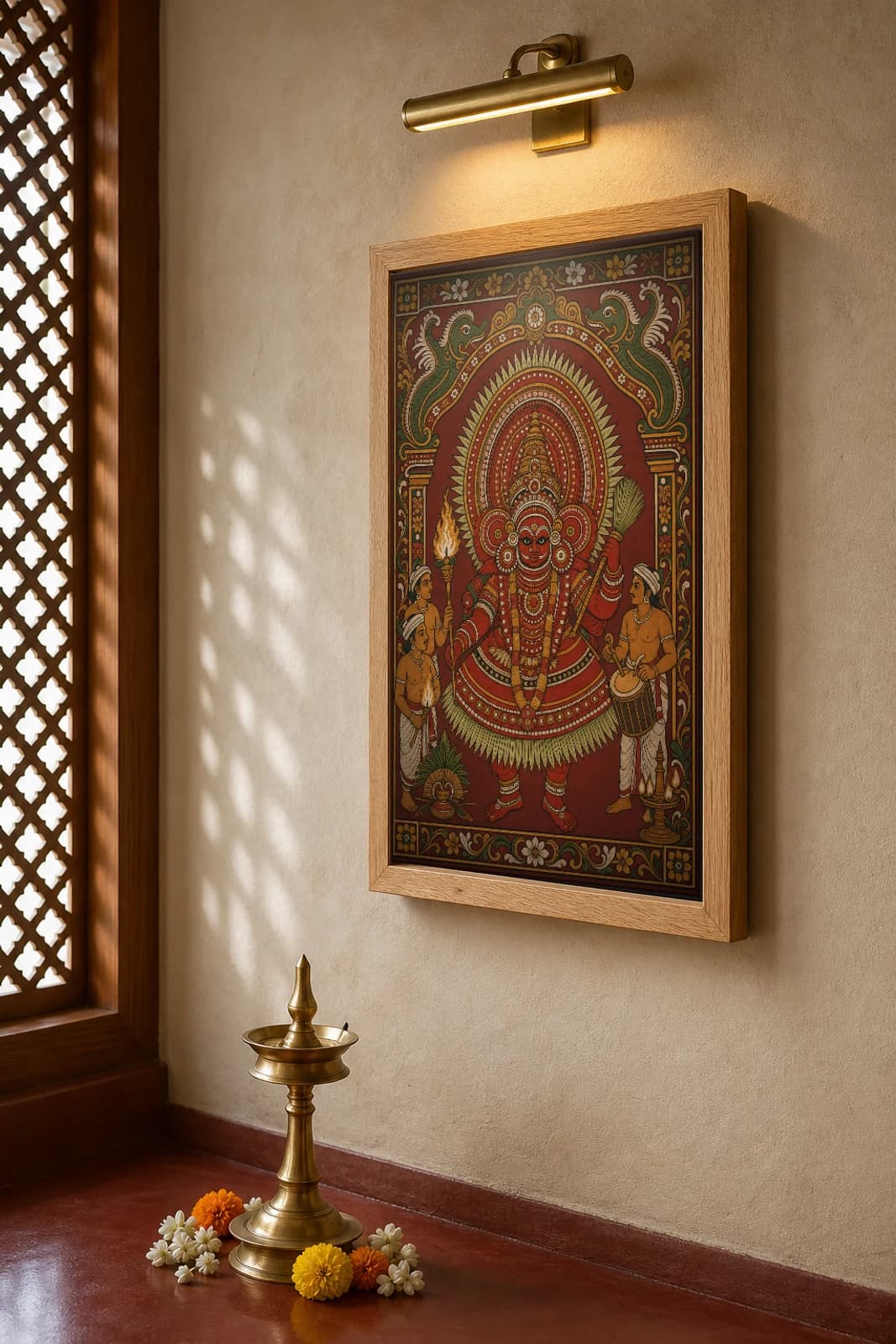 Theyyam Dancer Kerala Mural Art Print — the deified ritual performer in towering mudi headdress and red costume in panchavarna bhitti-chitra style · collector edition A2 — the framed print shown at a three-quarter angle on a styled gallery wall in a natural-oak frame