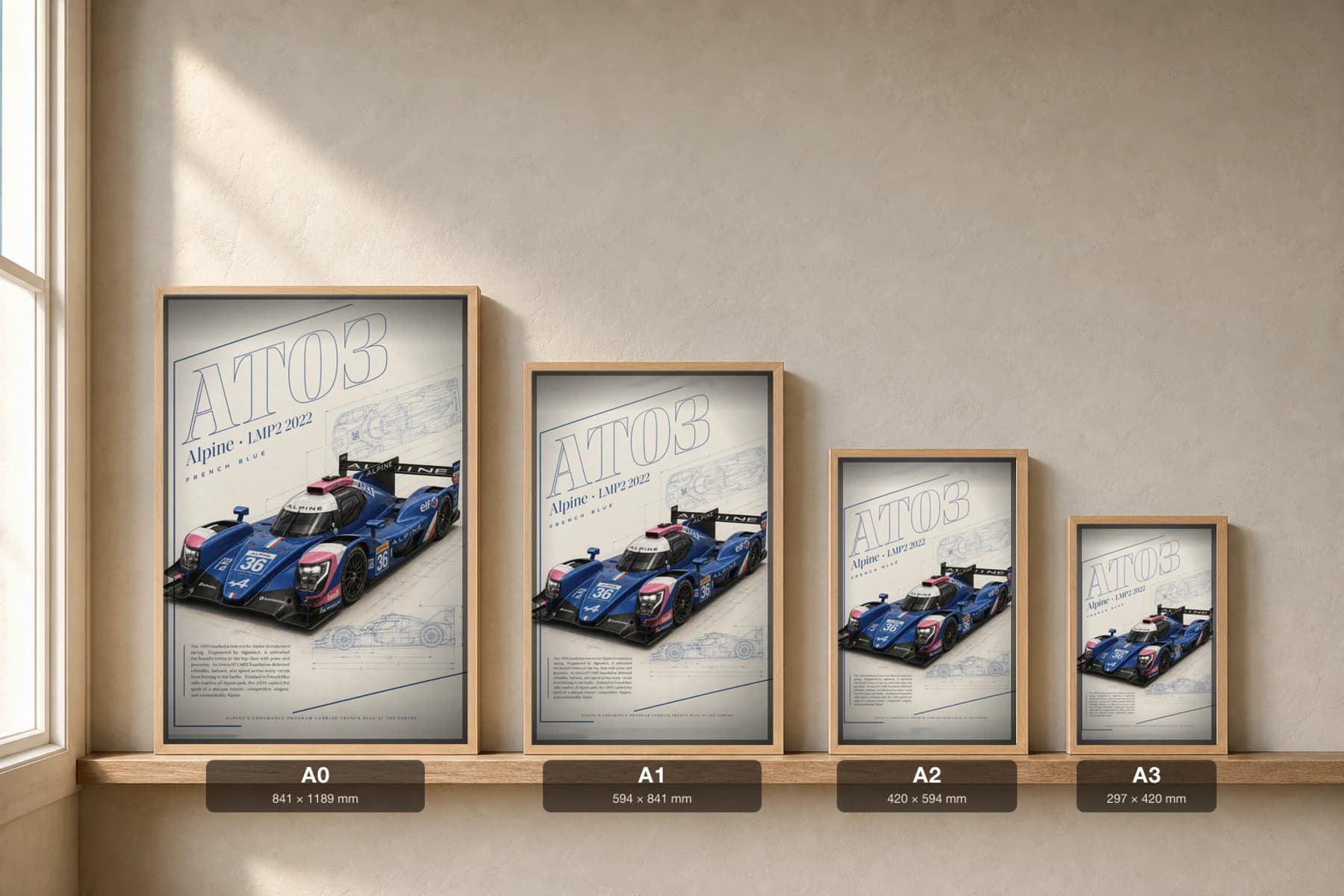 Alpine AT03 LMP2 Poster — 2022 24 Hours of Le Mans Endurance Racing Wall Art · framed A2 — print size guide showing the artwork at A0, A1, A2 and A3 in natural-oak frames at true relative scale