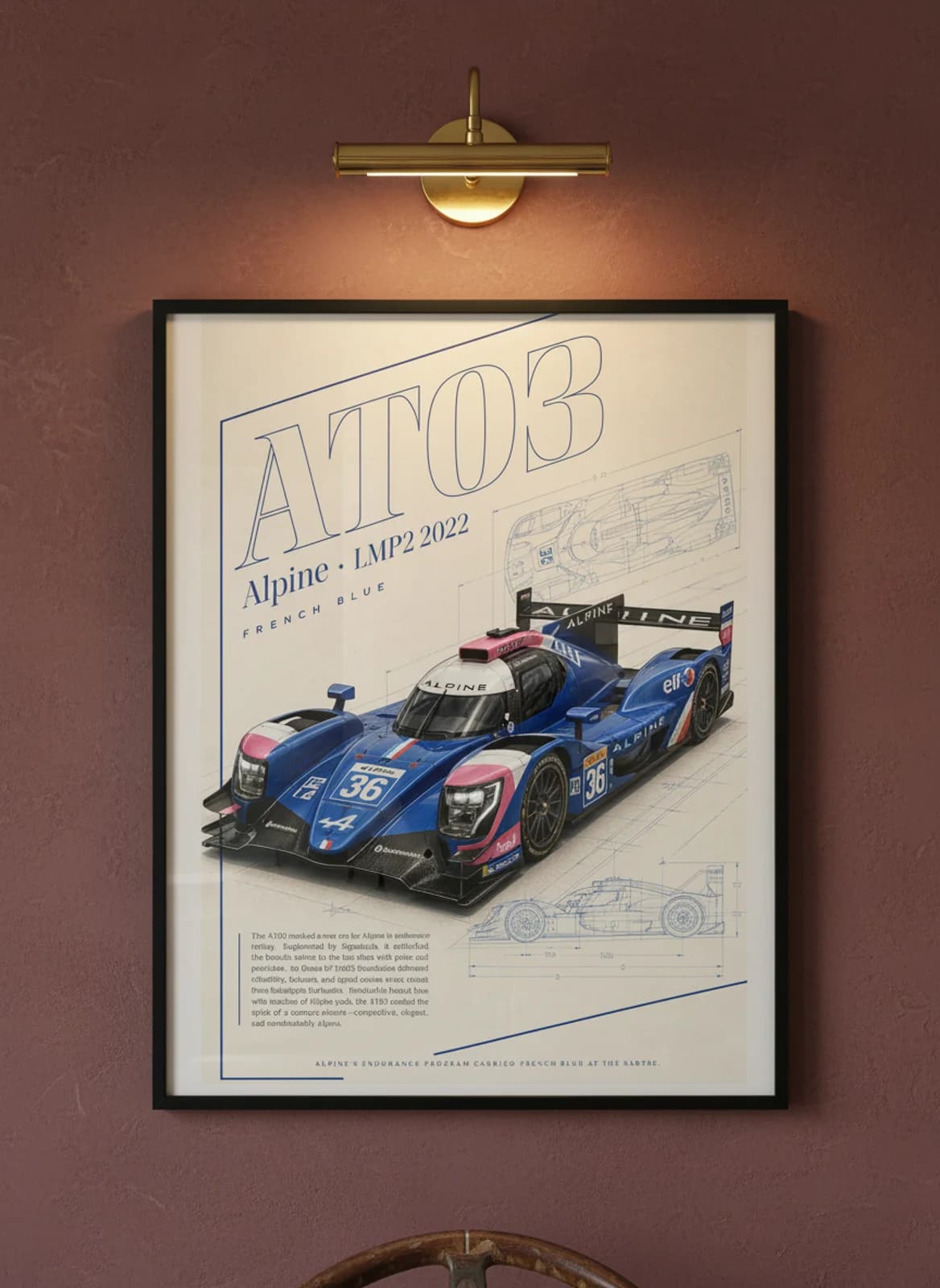 AT03 Le Mans endurance print in black A2 frame on warm-off-white-parchment oxblood wall — Le Mans mockup