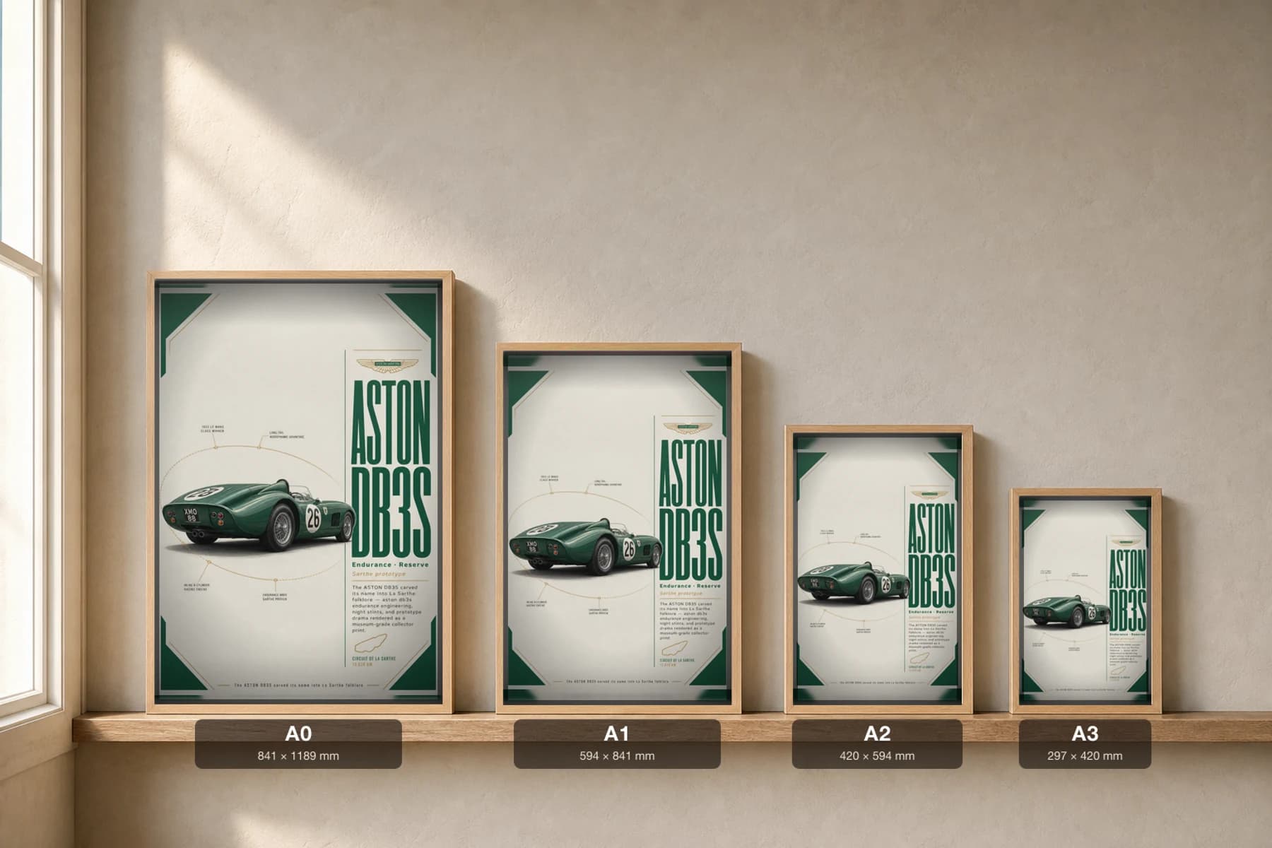 Aston Martin DB3S Poster — 1953 24 Hours of Le Mans Endurance Racing Wall Art · framed A2 — print size guide showing the artwork at A0, A1, A2 and A3 in natural-oak frames at true relative scale