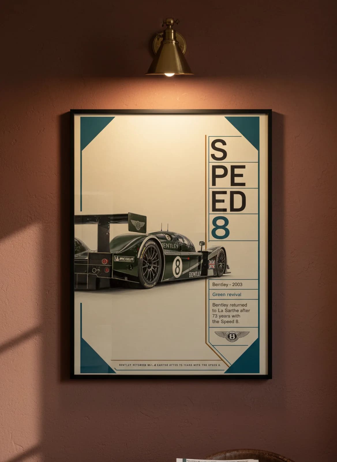 Speed 8 Le Mans endurance print in black A2 frame on warm-cream-parchment oxblood wall — Le Mans mockup