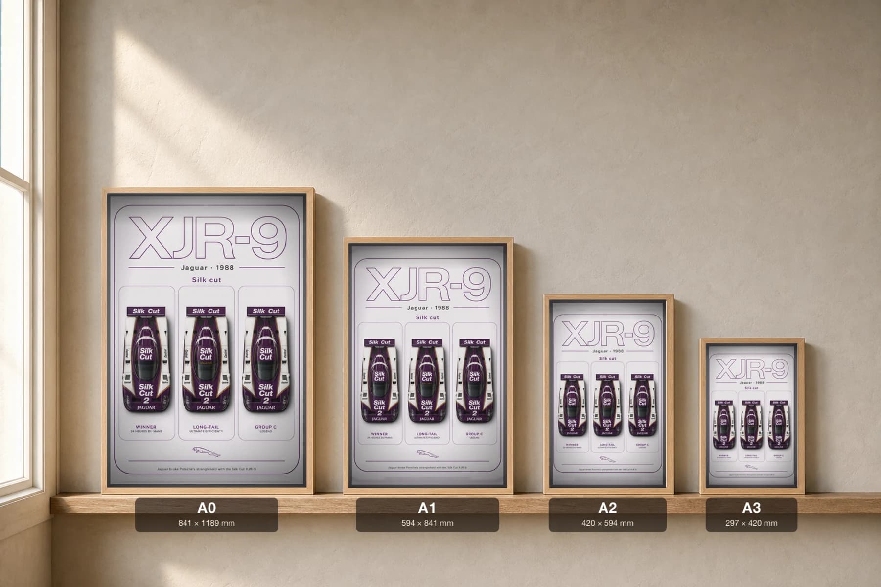 Jaguar XJR-9 Poster — 1988 24 Hours of Le Mans Endurance Racing Wall Art · framed A2 — print size guide showing the artwork at A0, A1, A2 and A3 in natural-oak frames at true relative scale