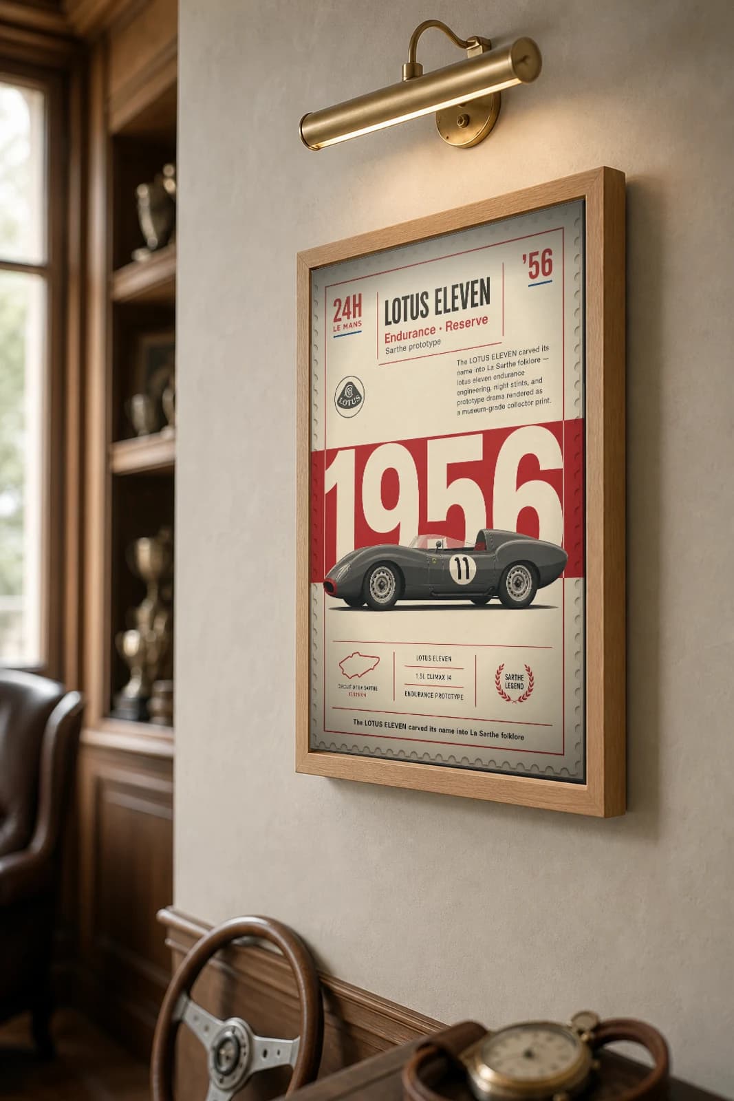 Lotus Eleven Poster — 1956 24 Hours of Le Mans Endurance Racing Wall Art · framed A2 — the framed print shown at a three-quarter angle on a styled gallery wall in a natural-oak frame