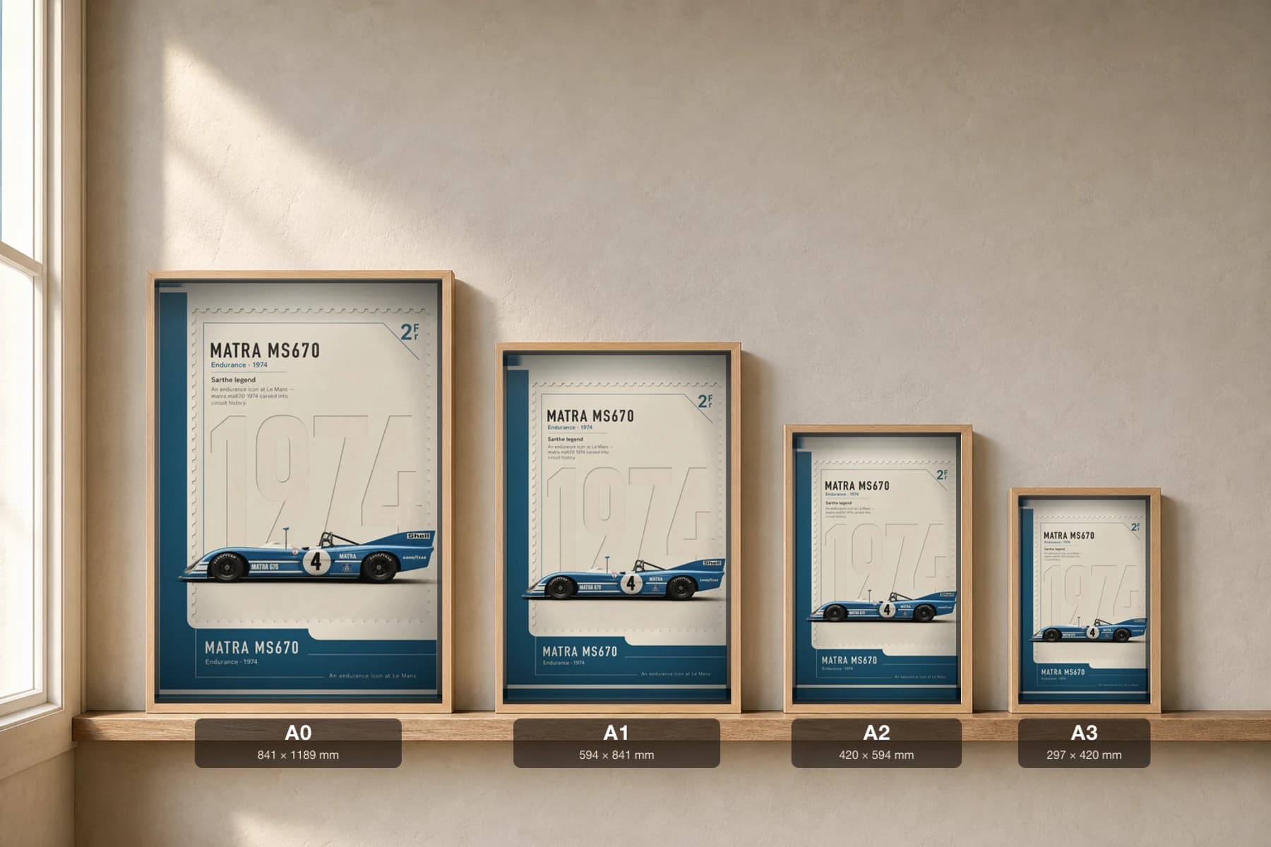 Matra MS670 Poster — 1974 24 Hours of Le Mans Endurance Racing Wall Art · framed A2 — print size guide showing the artwork at A0, A1, A2 and A3 in natural-oak frames at true relative scale