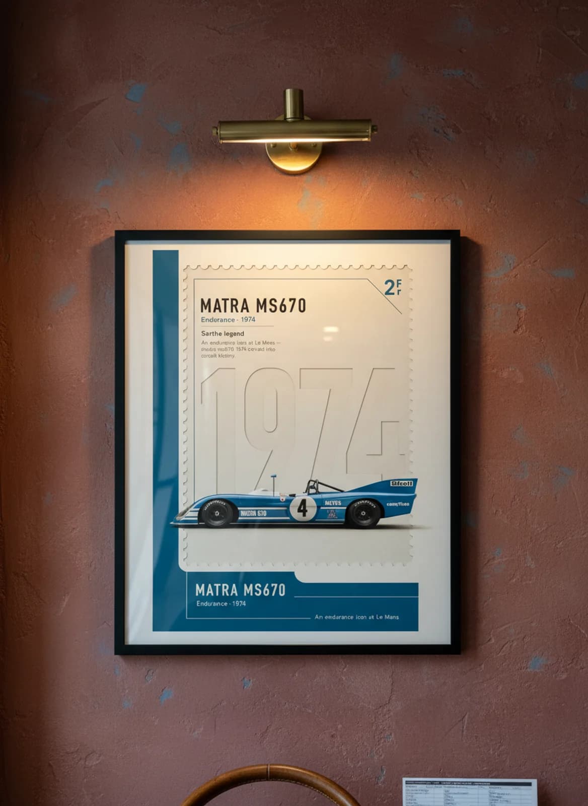 Matra MS670 Le Mans endurance print in black A2 frame on warm-parchment-paper oxblood wall — Le Mans mockup