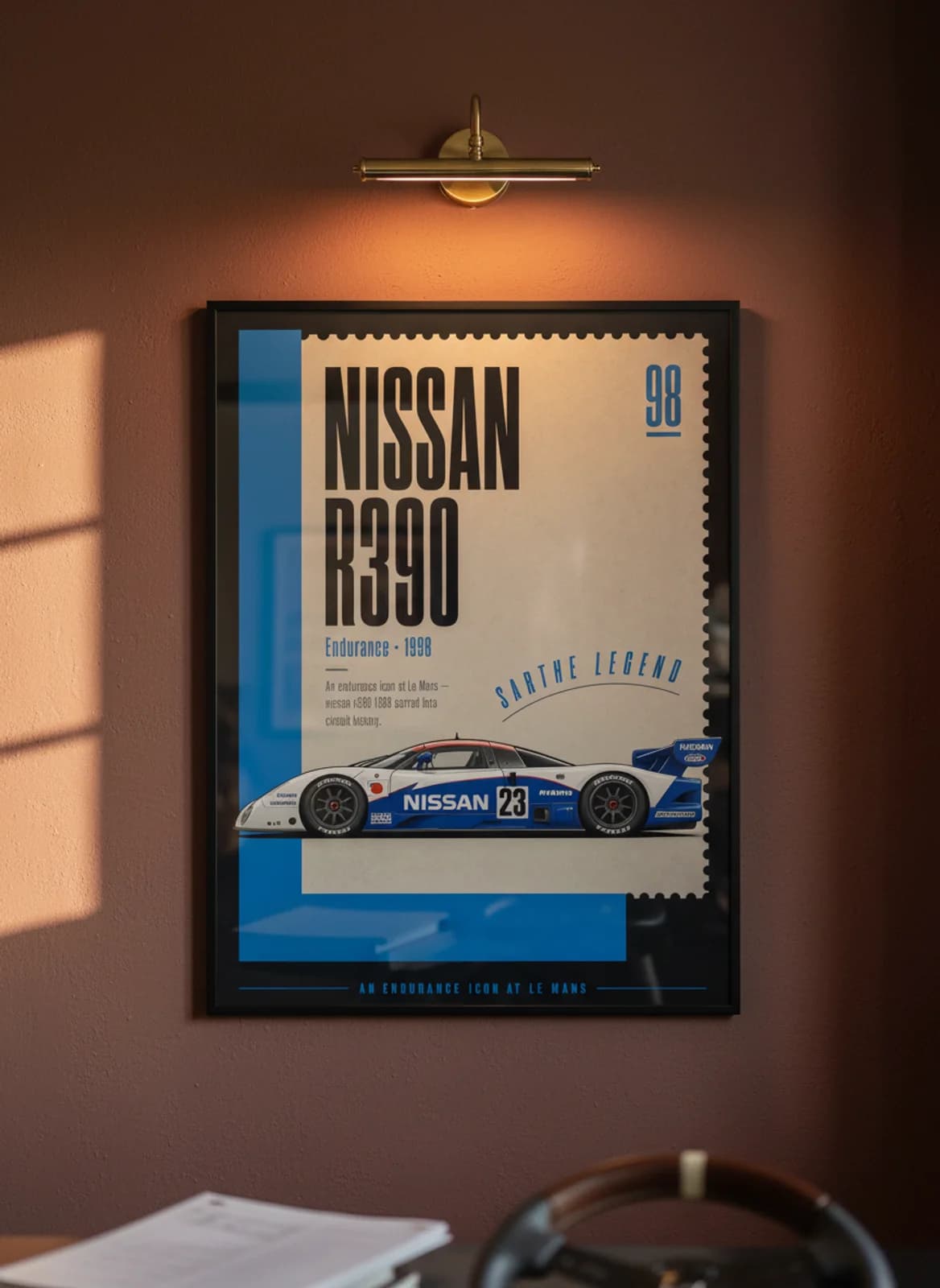 Nissan R390 GT1 Le Mans endurance print in black A2 frame on warm-parchment-paper oxblood wall — Le Mans mockup