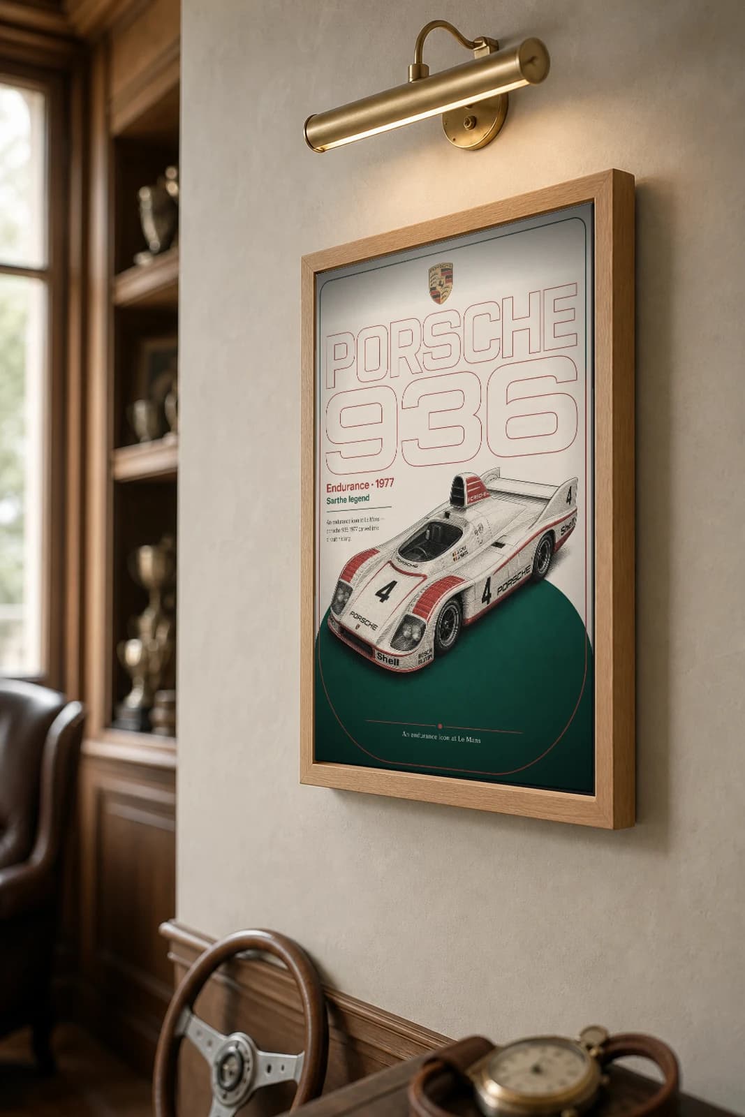 Porsche 936 Poster — 1977 24 Hours of Le Mans Endurance Racing Wall Art · framed A2 — the framed print shown at a three-quarter angle on a styled gallery wall in a natural-oak frame
