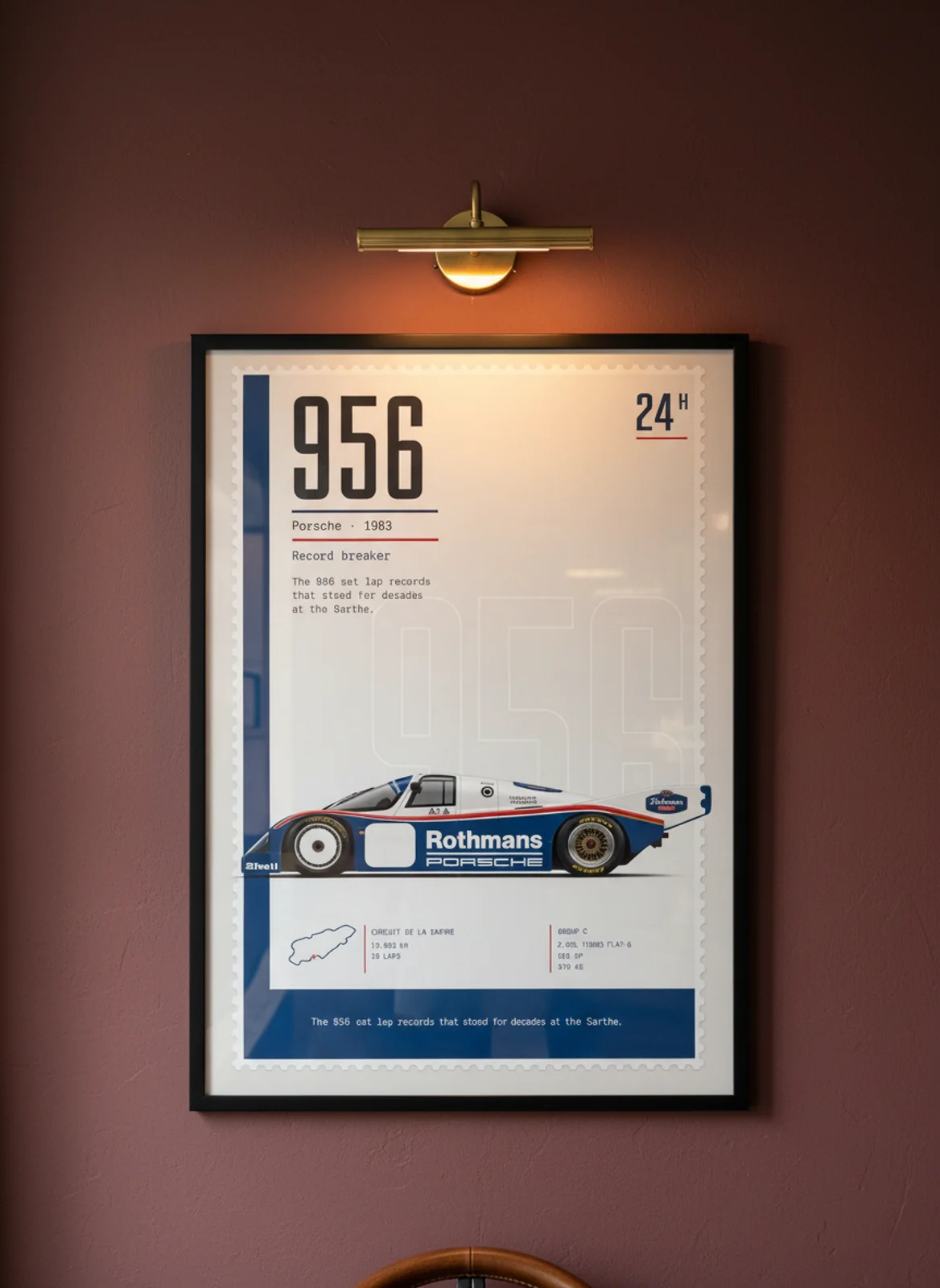 956 Rothmans Le Mans endurance print in black A2 frame on warm-parchment oxblood wall — Le Mans mockup