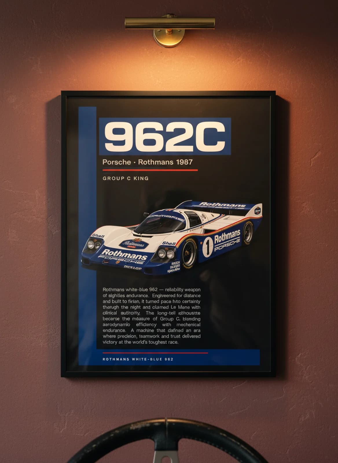 962C Rothmans Le Mans endurance print in black A2 frame on warm-parchment oxblood wall — Le Mans mockup