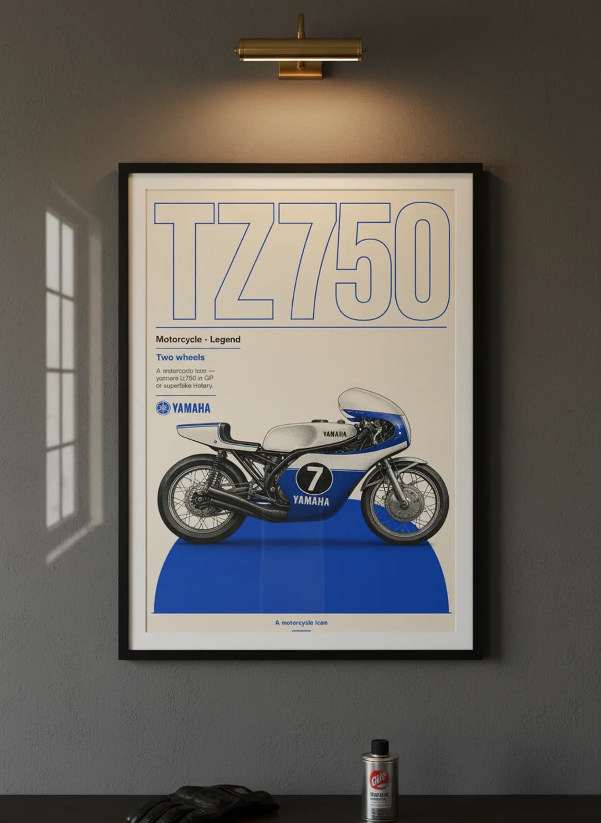 TZ750 MotoGP Legends print in black A2 frame on yamaha-blue charcoal garage wall — motorcycle lounge mockup