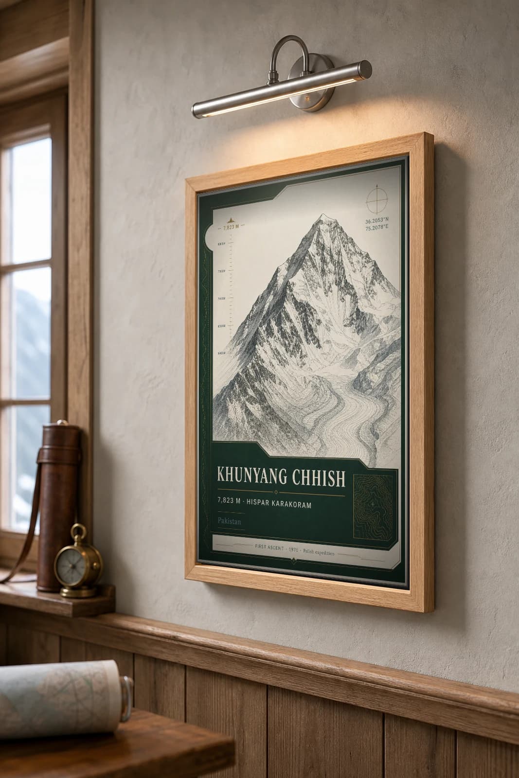 Khunyang Chhish Poster — 7,823 m Peak Atlas Specimen Print · framed A2 — the framed print shown at a three-quarter angle on a styled gallery wall in a natural-oak frame