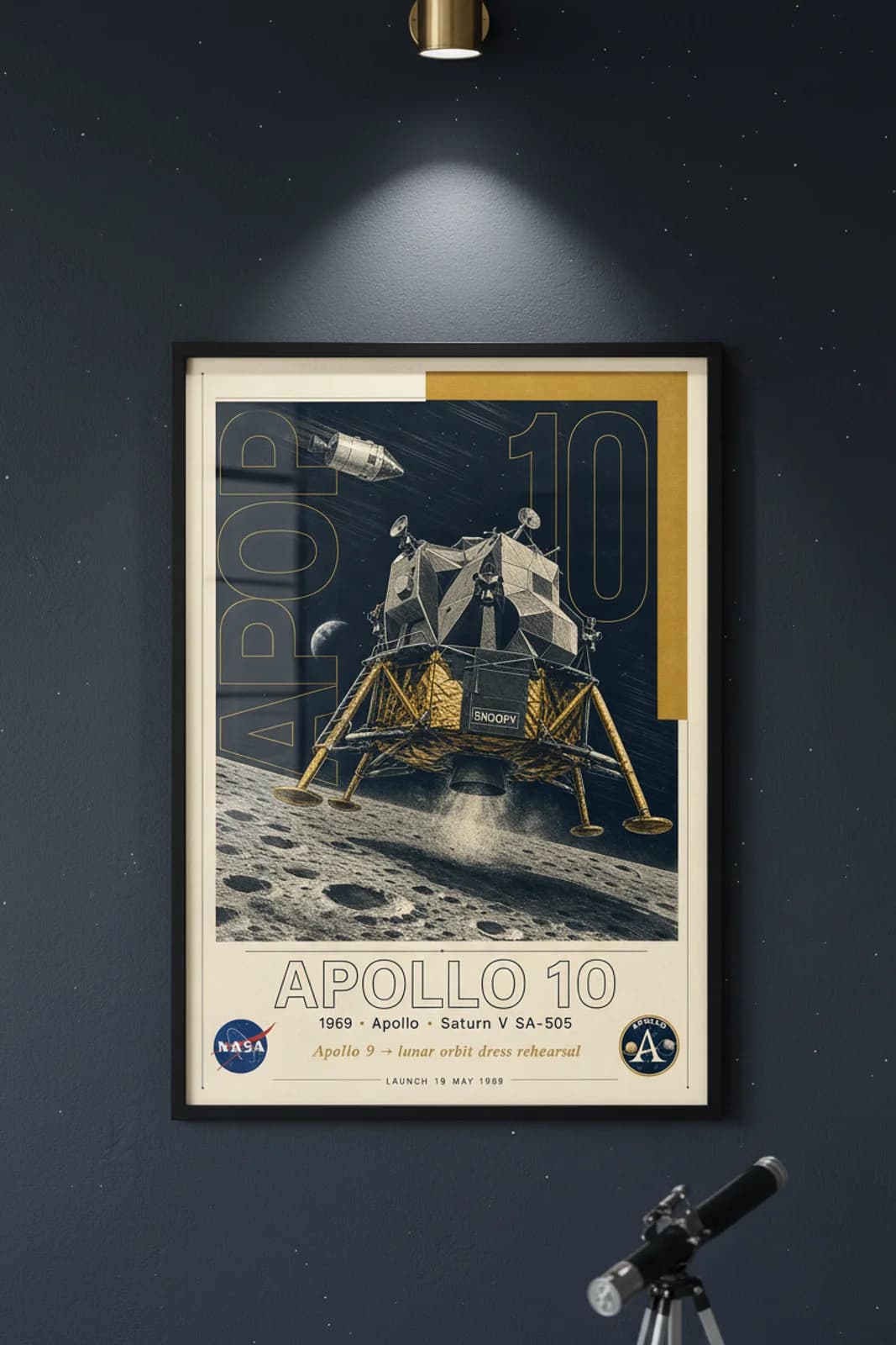 Apollo 10 poster in black A2 frame on lm-gold-foil deep space navy wall — NASA Heritage collector study mockup