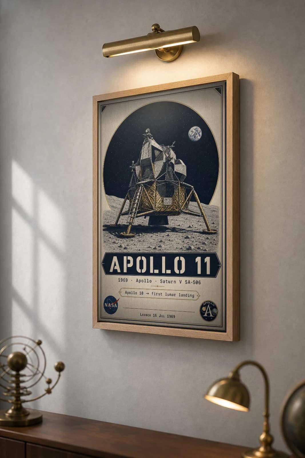 Apollo 11 Poster — 1969 Saturn V SA-506 NASA Heritage Collector Print — the framed print shown at a three-quarter angle on a styled gallery wall in a natural-oak frame