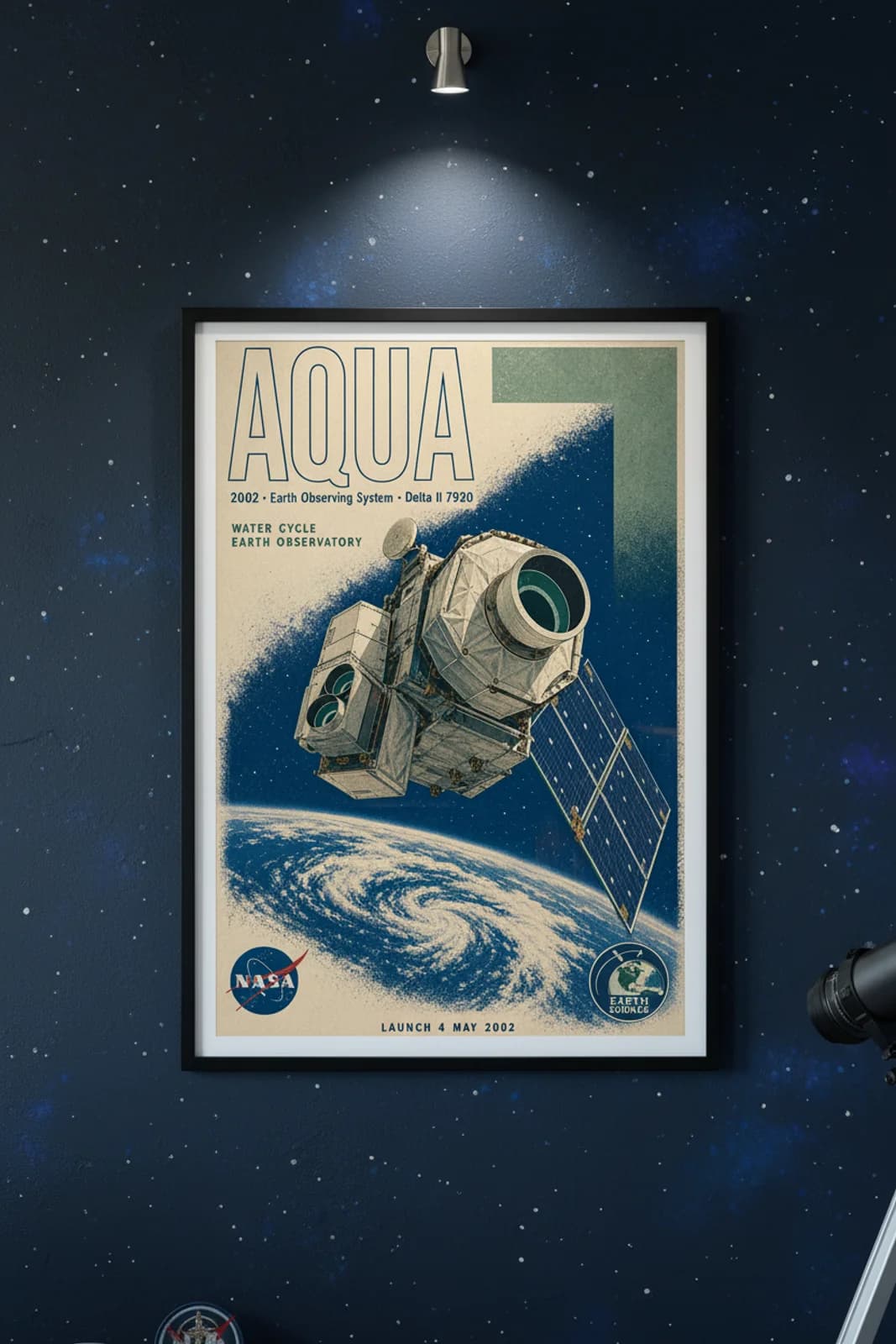 Aqua poster in black A2 frame on deep-navy-star-field deep space navy wall — NASA Heritage collector study mockup