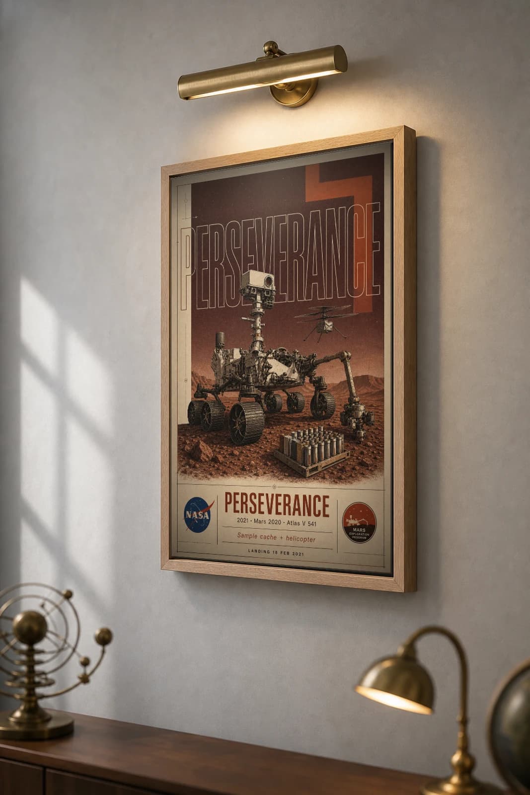 Perseverance Poster — 2021 Mars 2020 NASA Heritage Collector Print — the framed print shown at a three-quarter angle on a styled gallery wall in a natural-oak frame