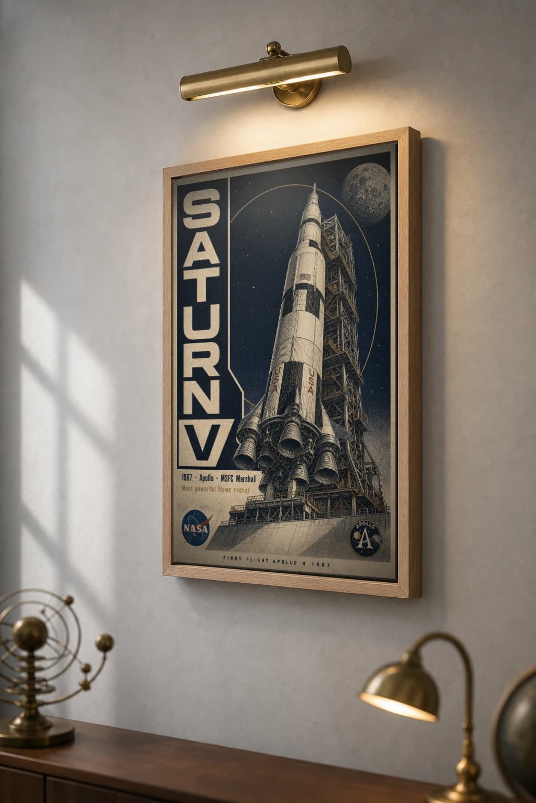 Saturn V Poster — 1967 Apollo Moon Rocket NASA Heritage Collector Print — the framed print shown at a three-quarter angle on a styled gallery wall in a natural-oak frame