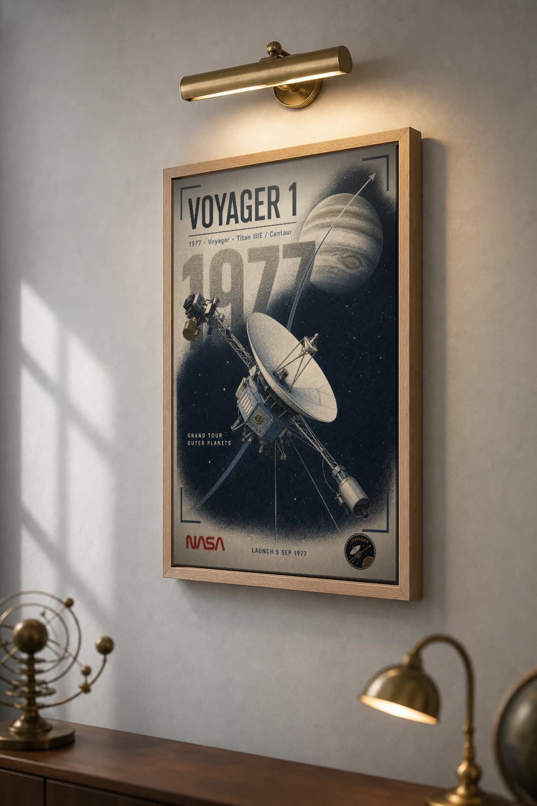 Voyager 1 Poster — 1977 Titan IIIE / Centaur NASA Heritage Collector Print — the framed print shown at a three-quarter angle on a styled gallery wall in a natural-oak frame