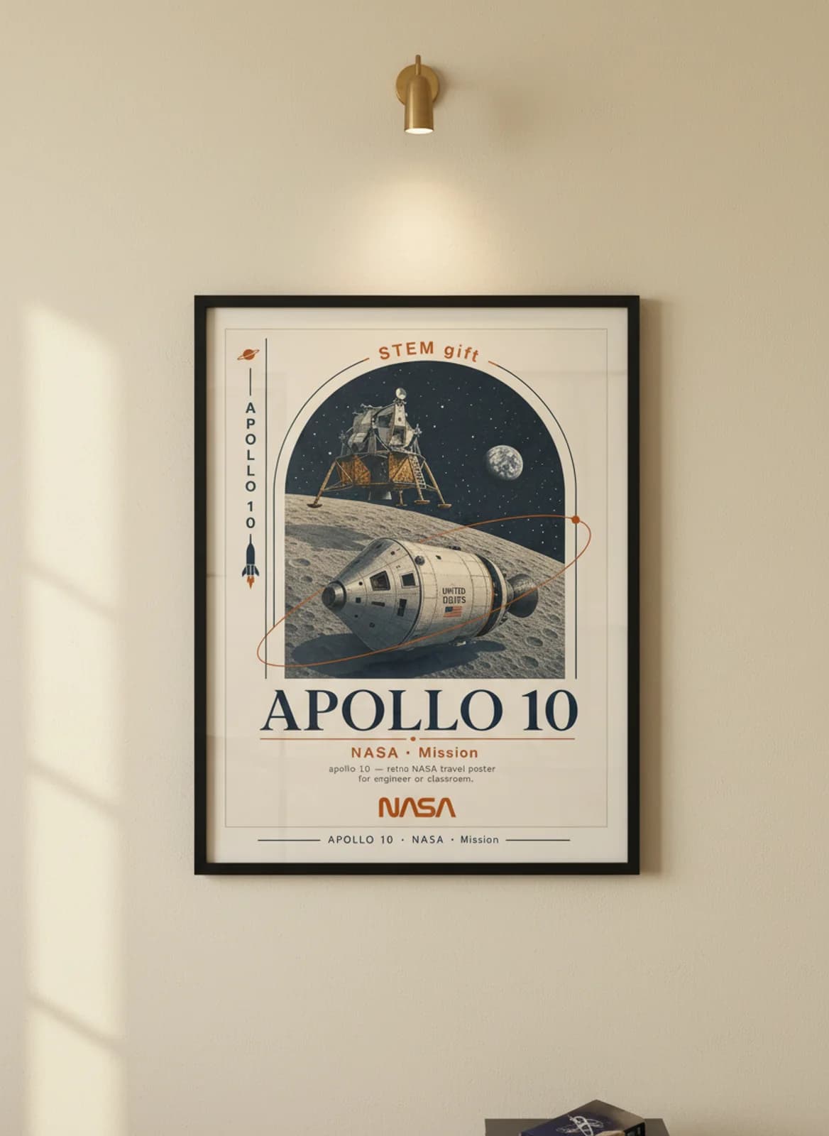 APOLLO 10 — NASA Missions poster in black A2 frame on warm-cream-paper wall matching print paper — NASA Missions study mockup