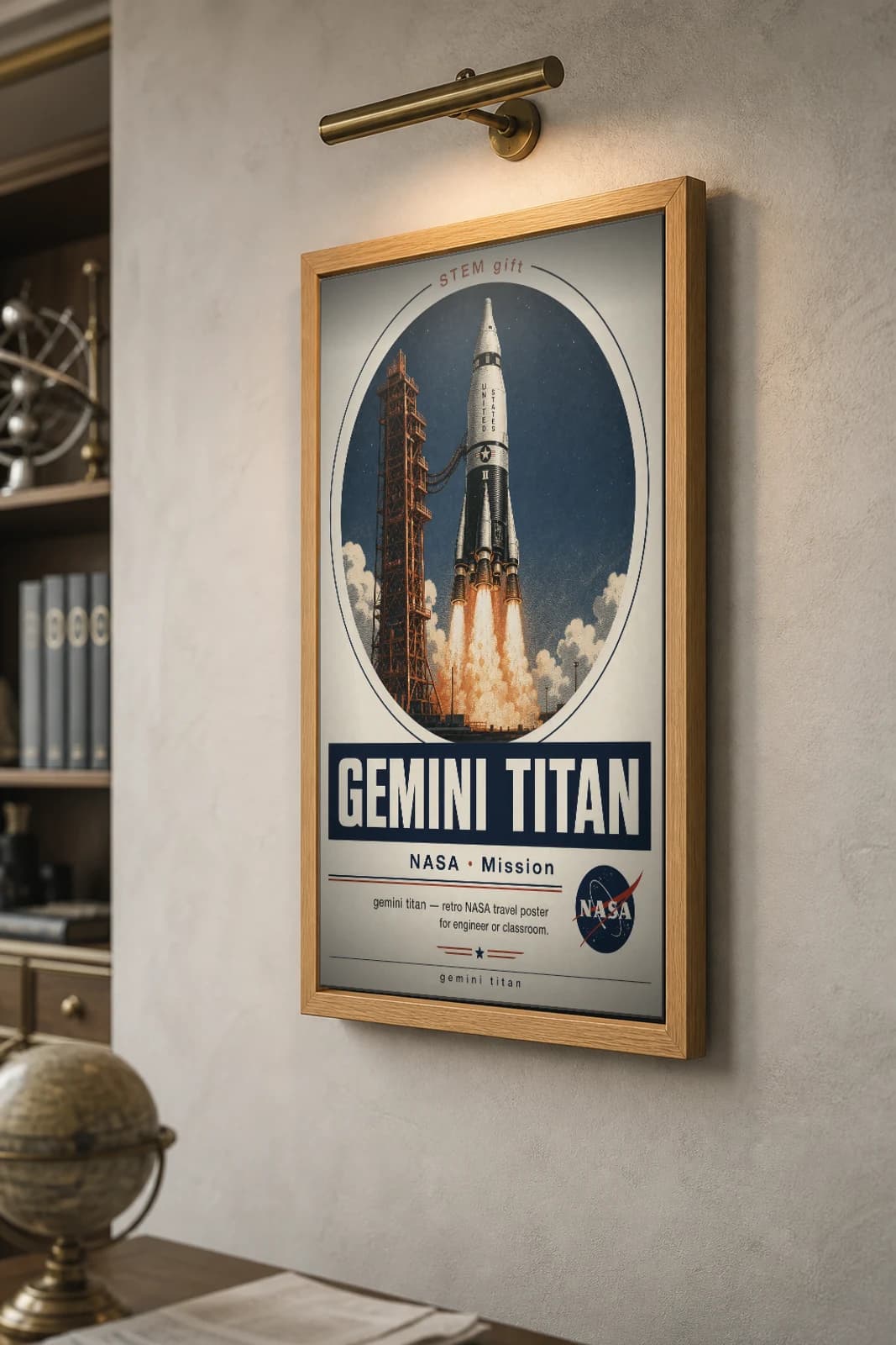 GEMINI TITAN Poster — 1970 GEMINI TITAN spacecraft NASA Missions Commemorative Sheet — the framed print shown at a three-quarter angle on a styled gallery wall in a natural-oak frame