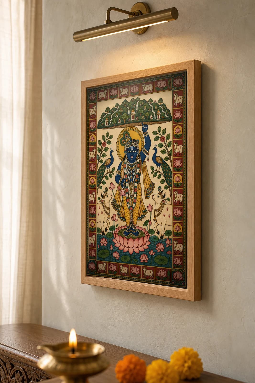 Shrinathji Darshan Pichwai-Style Print — The Govardhan-Lifter on a Lotus · collector A2 · Nathdwara, Rajasthan cloth-painting tradition — the framed print shown at a three-quarter angle on a styled gallery wall in a natural-oak frame