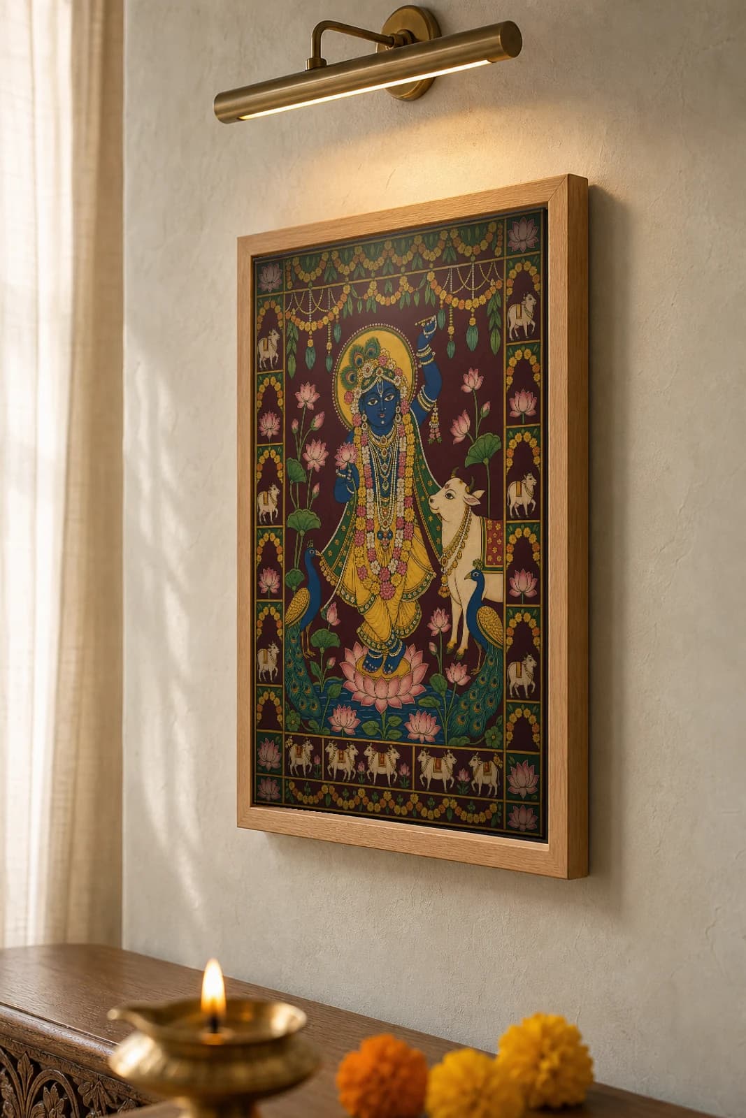 Shringar Darshan Pichwai-Style Print — Shrinathji Dressed for Seasonal Shringar · collector A2 · Nathdwara, Rajasthan cloth-painting tradition — the framed print shown at a three-quarter angle on a styled gallery wall in a natural-oak frame