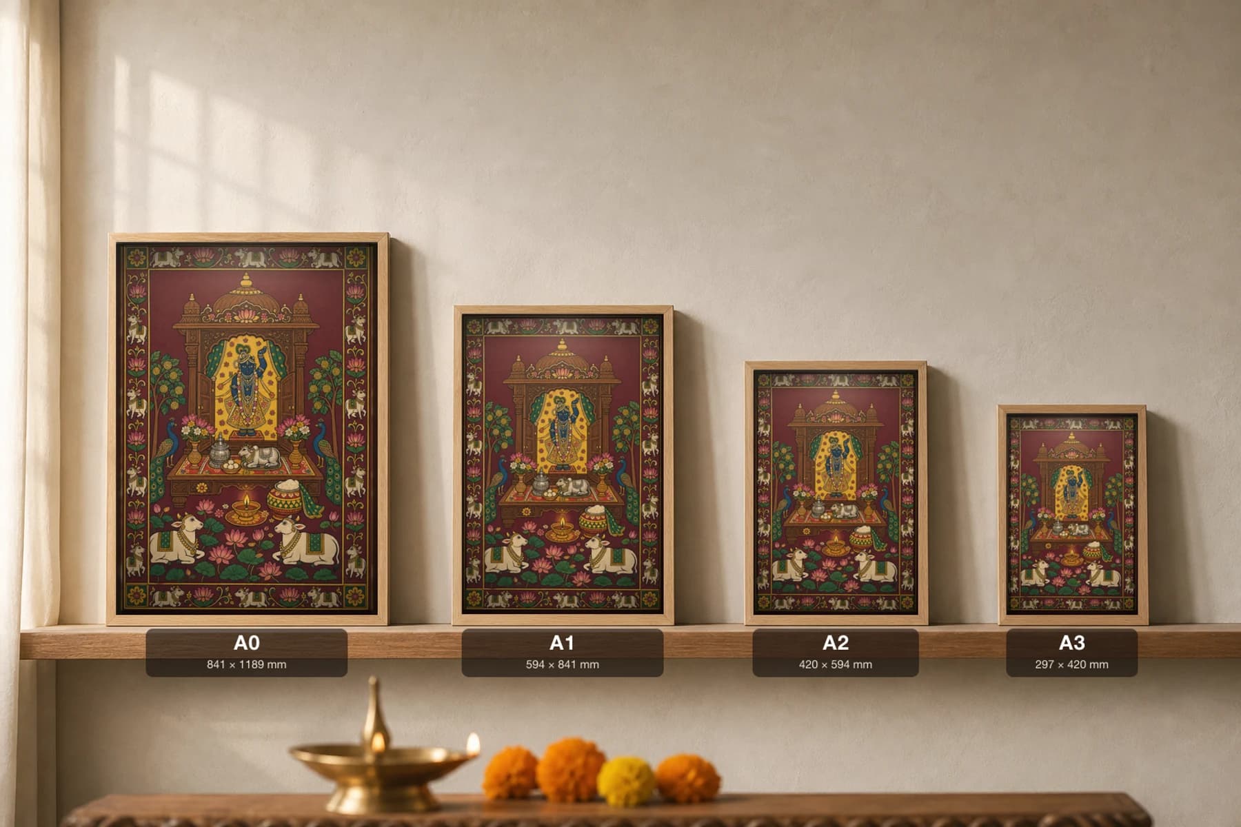 Ghar Ka Mandir Pichwai-Style Print — The Family's Dressed Thakurji Shrine · collector A2 · contemporary × Nathdwara Pichwai fusion — print size guide showing the artwork at A0, A1, A2 and A3 in natural-oak frames at true relative scale