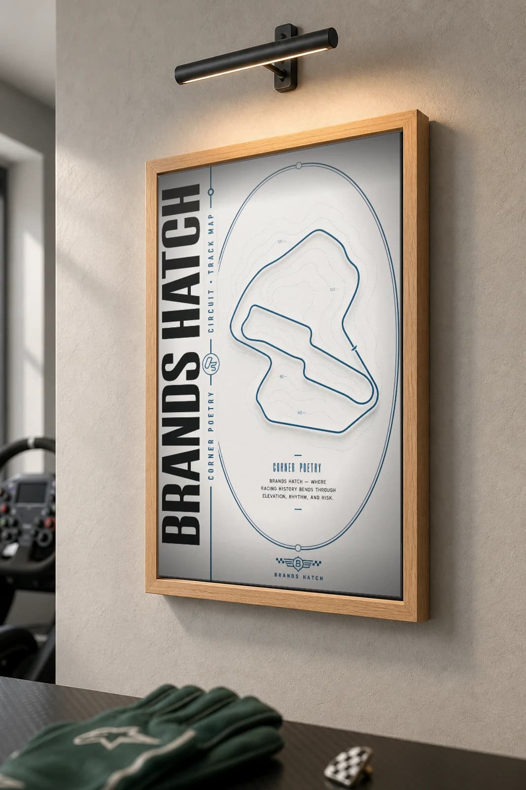 Brands Hatch Circuit Poster — United Kingdom circuit map wall art · FIA Formula 1 World Championship track layout · framed A2 — the framed print shown at a three-quarter angle on a styled gallery wall in a natural-oak frame