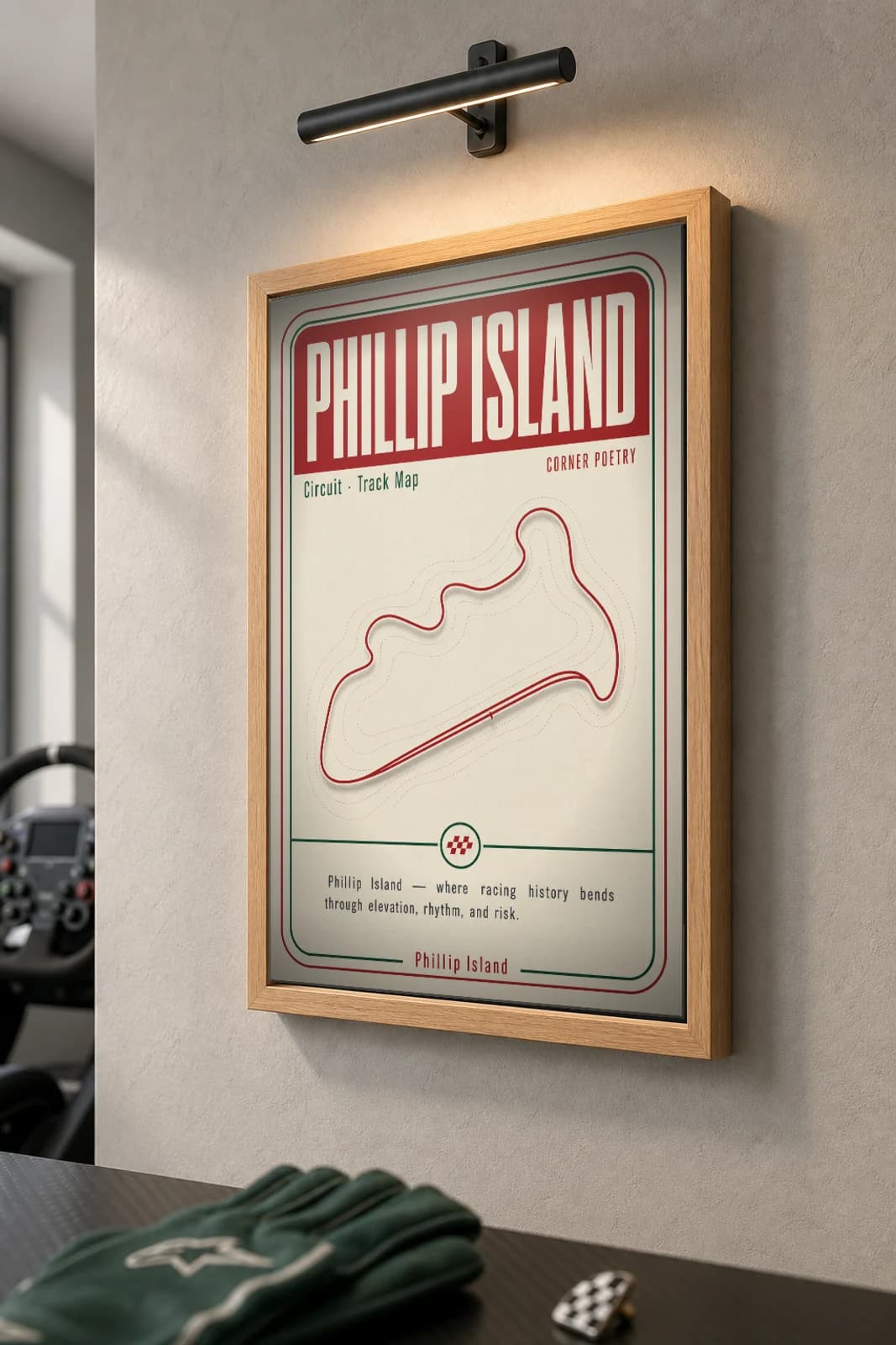 Phillip Island Grand Prix Circuit Poster — Australia circuit map wall art · MotoGP track layout · framed A2 — the framed print shown at a three-quarter angle on a styled gallery wall in a natural-oak frame