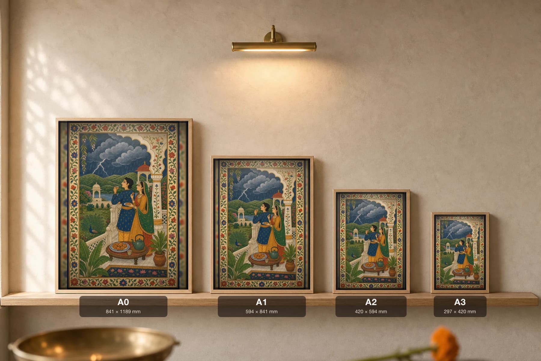 Monsoon Balcony Pakora Rajput Miniature Print — Kangra-style fusion, a couple watching the rains with hot pakoras and chai · collector edition A2 — print size guide showing the artwork at A0, A1, A2 and A3 in natural-oak frames at true relative scale