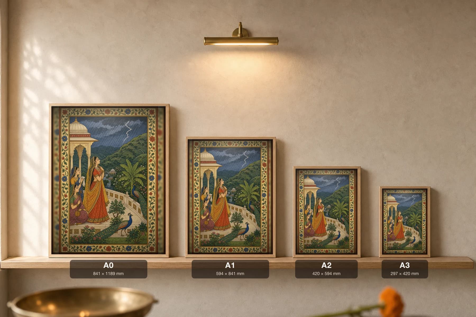 Sawan Baramasa Rajput Miniature Print — Kangra monsoon month, a lady watching the rains with dancing peacocks · collector edition A2 — print size guide showing the artwork at A0, A1, A2 and A3 in natural-oak frames at true relative scale