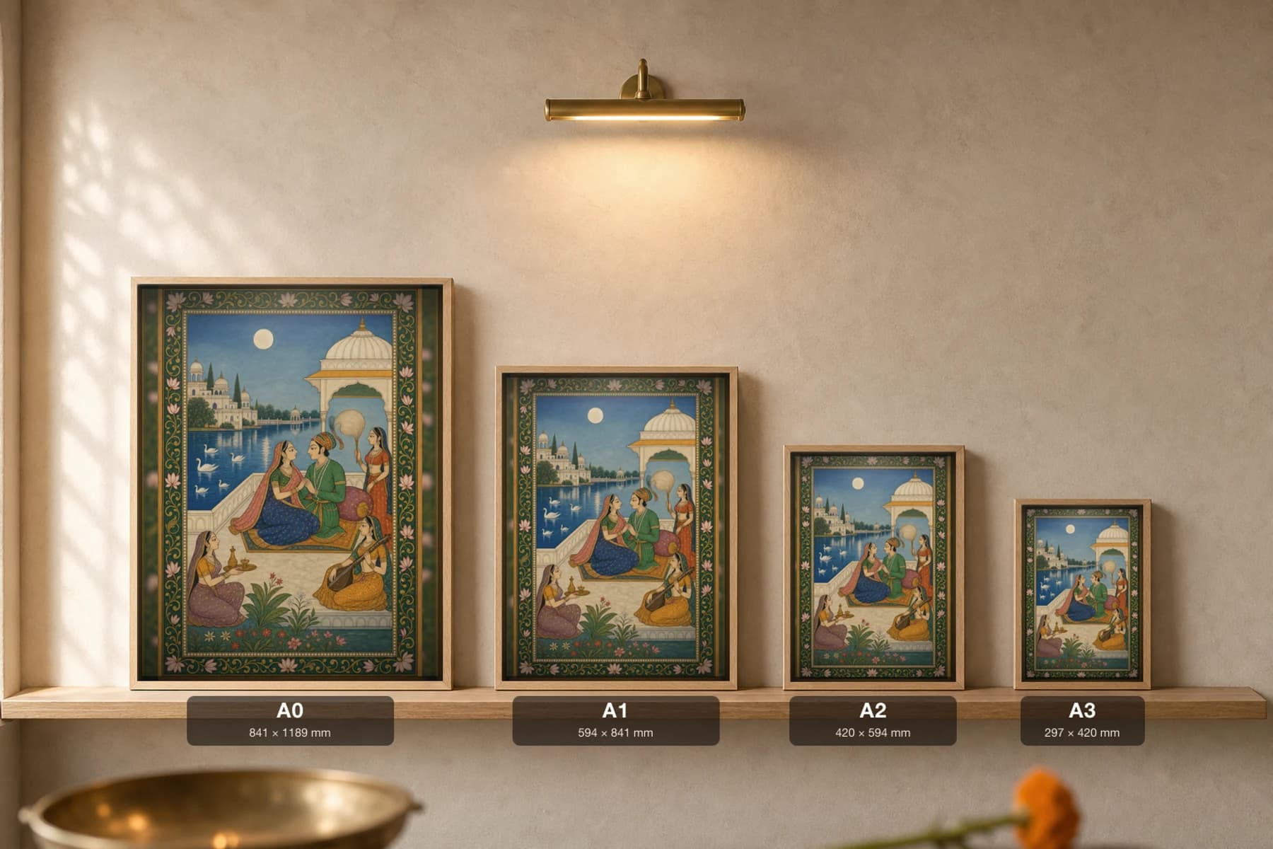 Sharad Baramasa Rajput Miniature Print — Kishangarh autumn month, lovers on a lakeside terrace under the harvest moon · collector edition A2 — print size guide showing the artwork at A0, A1, A2 and A3 in natural-oak frames at true relative scale