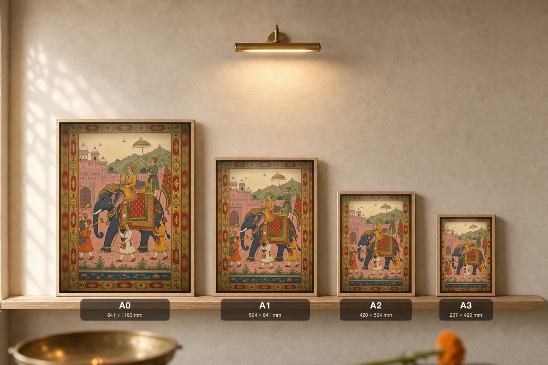 Gaj Sawari Rajput Miniature Print — Amber royal elephant procession, a prince on a caparisoned tusker beneath a parasol · collector edition A2 — print size guide showing the artwork at A0, A1, A2 and A3 in natural-oak frames at true relative scale