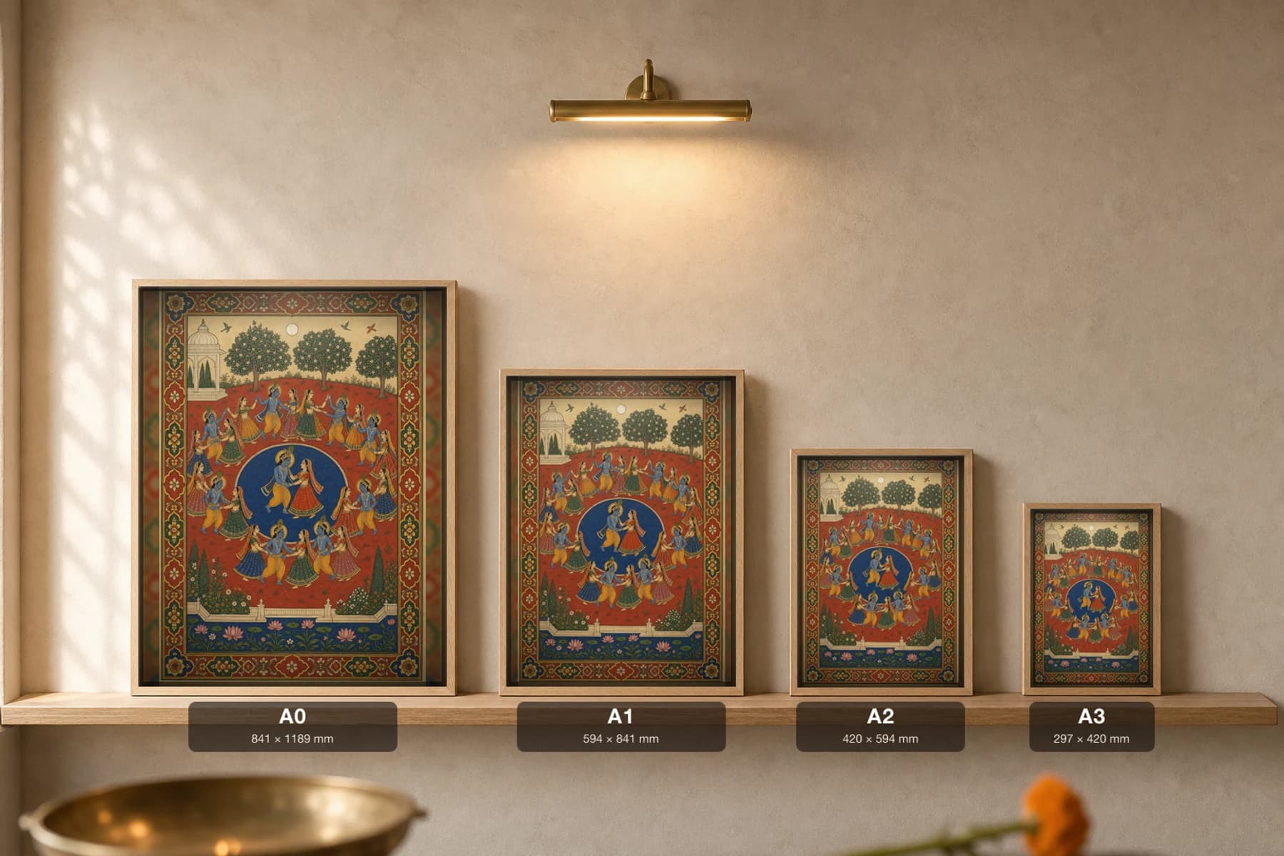 Raas Leela Rajput Miniature Print — Mewar Krishna-lila, the moonlit circle dance of Krishna and the gopis · collector edition A2 — print size guide showing the artwork at A0, A1, A2 and A3 in natural-oak frames at true relative scale