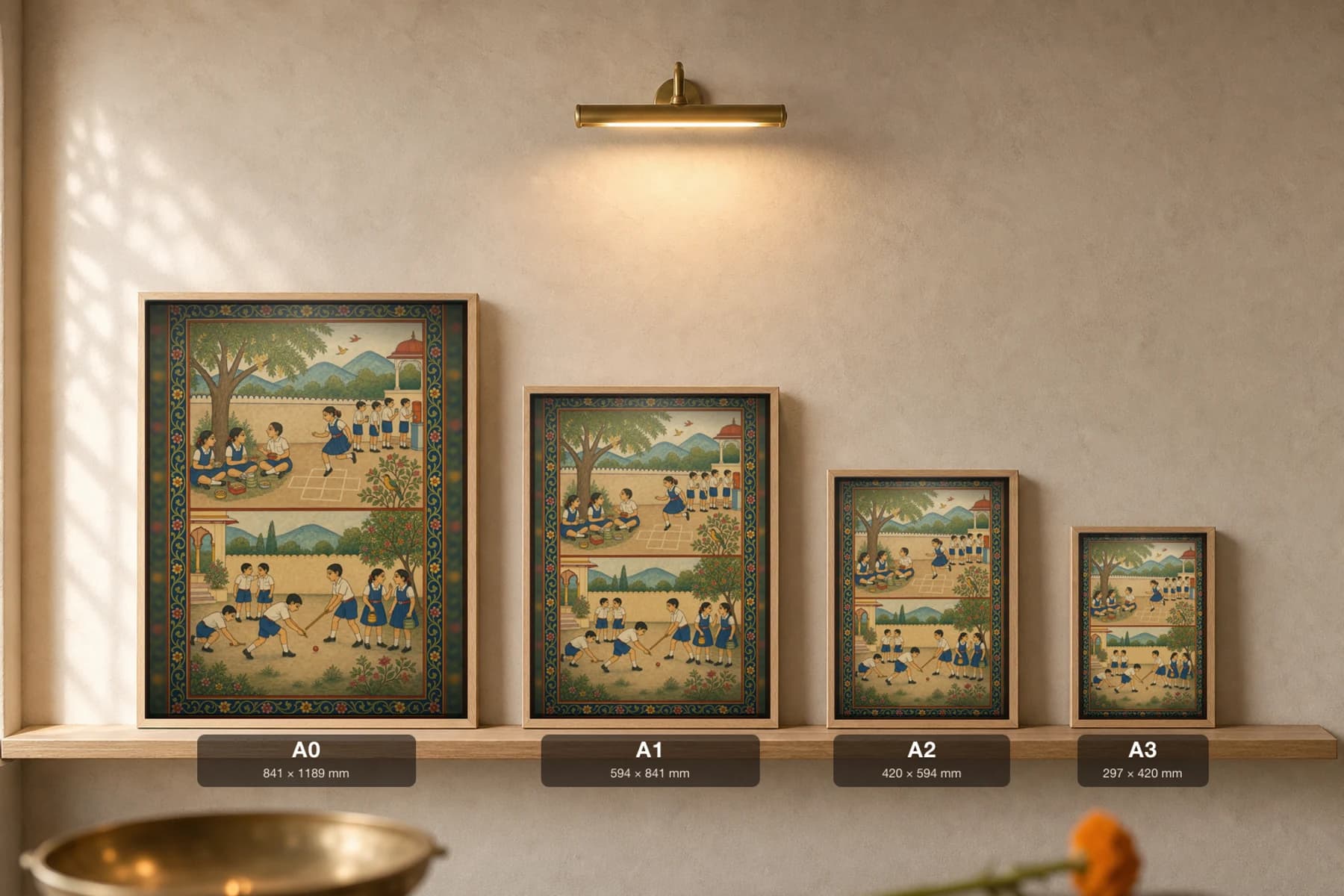 Madhyantar — School Tiffin Recess Rajput Miniature Art Print · collector edition A2 · children in uniform sharing tiffin and playing in a school yard, Kangra grammar — print size guide showing the artwork at A0, A1, A2 and A3 in natural-oak frames at true relative scale