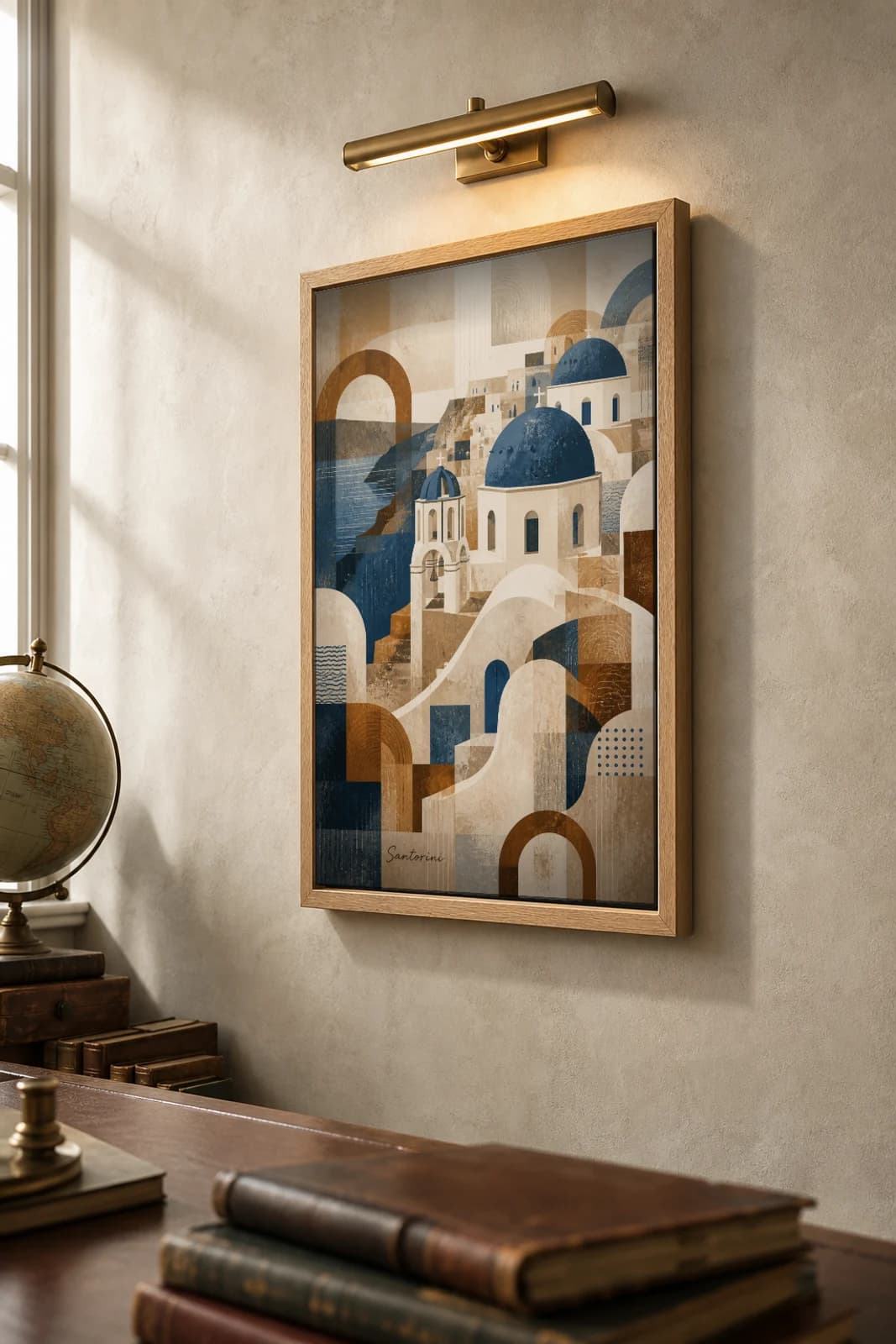 Santorini Poster — Greece travel wall art · city print · framed A2 — the framed print shown at a three-quarter angle on a styled gallery wall in a natural-oak frame