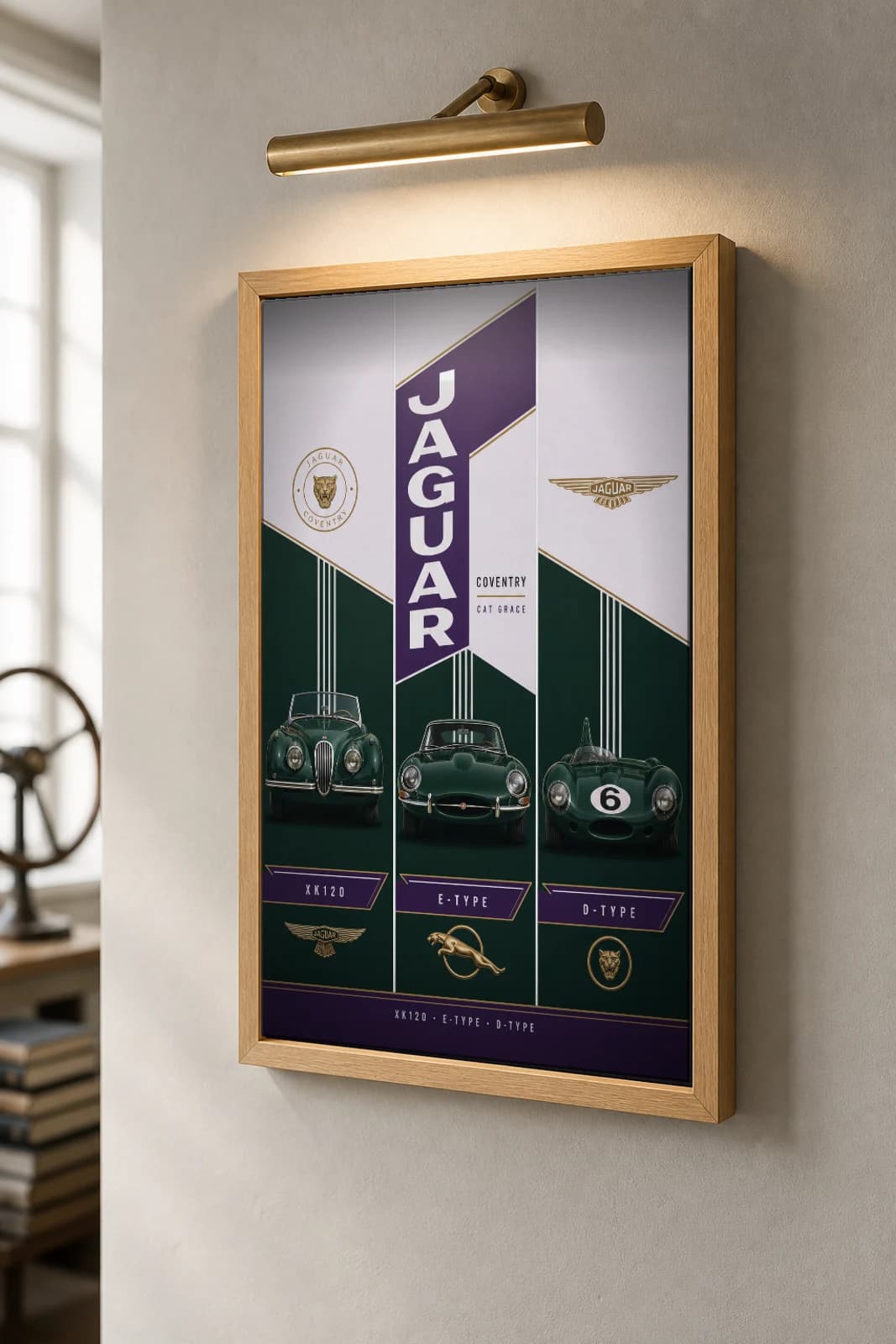 Jaguar XK120 / E-Type / D-Type Poster — Post-war sportscar · road car · endurance prototype WEC racing wall art · #6 · framed A2 — the framed print shown at a three-quarter angle on a styled gallery wall in a natural-oak frame