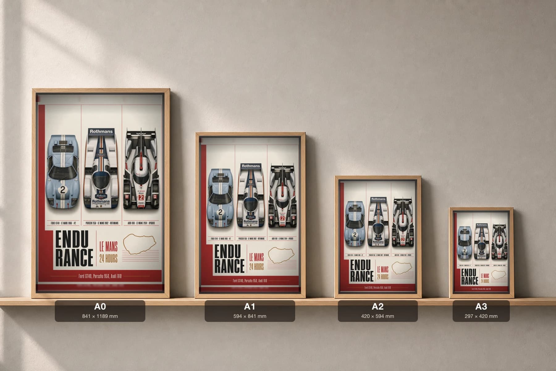 Factory / works endurance entries GT40 · 956 · R18 Poster — Le Mans-winning sportscars · Group C prototype · LMP1 hybrid WEC racing wall art · #2 · framed A2 — print size guide showing the artwork at A0, A1, A2 and A3 in natural-oak frames at true relative scale