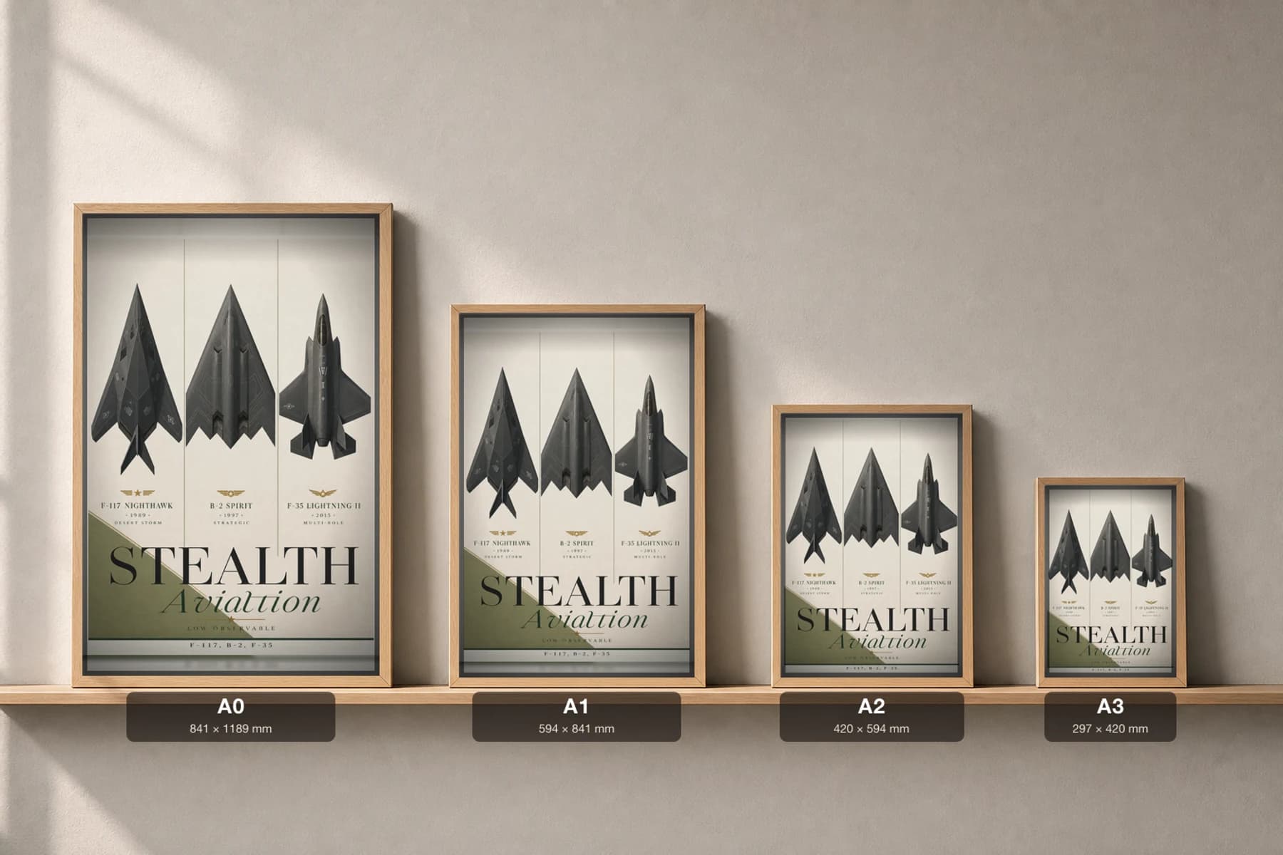 US Stealth Aviation Ensemble Poster — United States Air Force military aviation wall art · framed A2 · 1989–2015 — print size guide showing the artwork at A0, A1, A2 and A3 in natural-oak frames at true relative scale