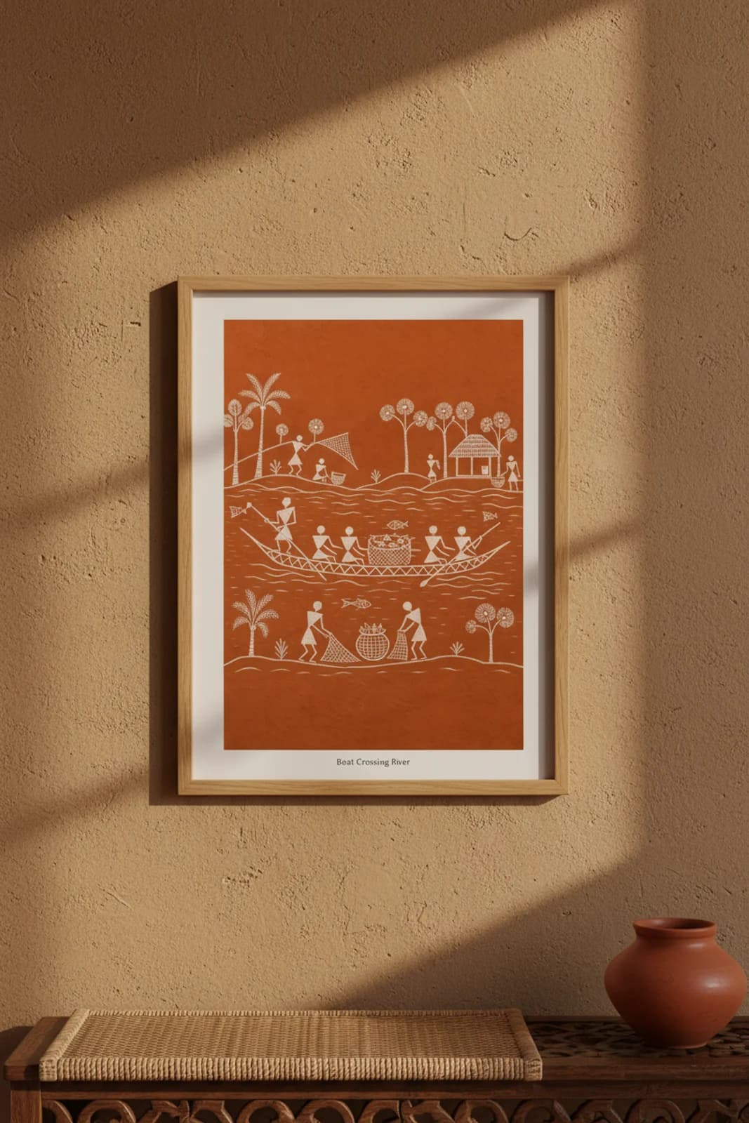 Boat Crossing River Warli print in natural oak A2 frame on warm-earth-neutral mud-plaster wall — rustic Indian folk art mockup