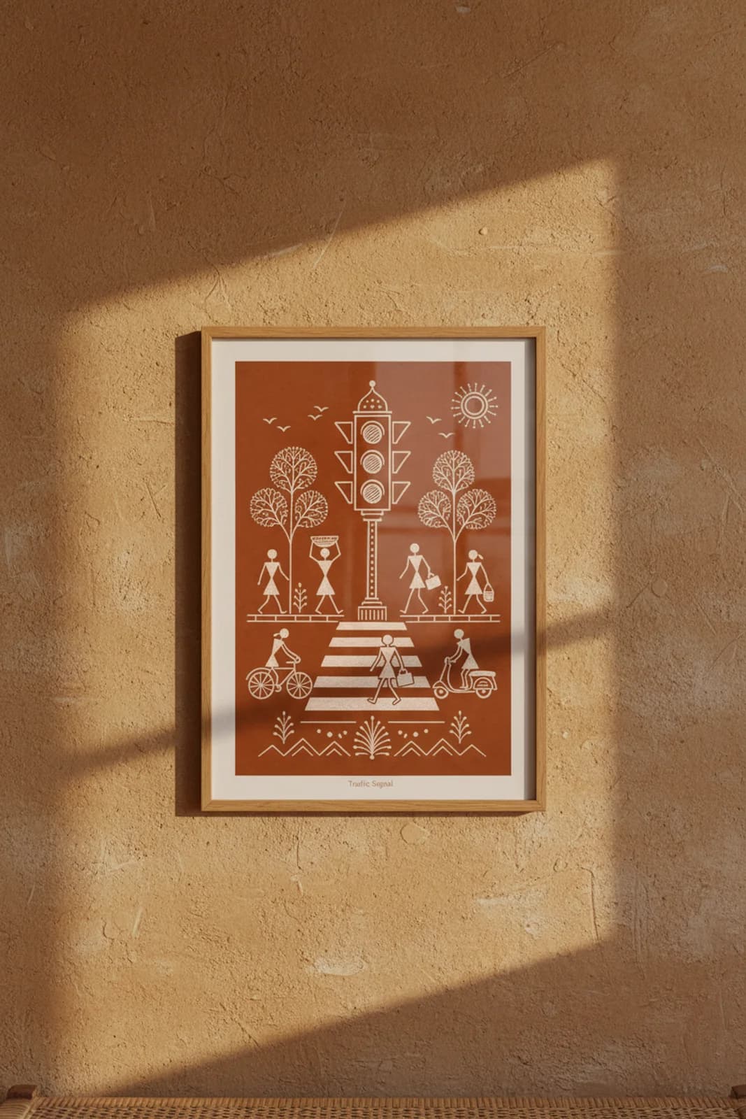 Traffic Signal Warli print in natural oak A2 frame on warm-earth-neutral mud-plaster wall — rustic Indian folk art mockup