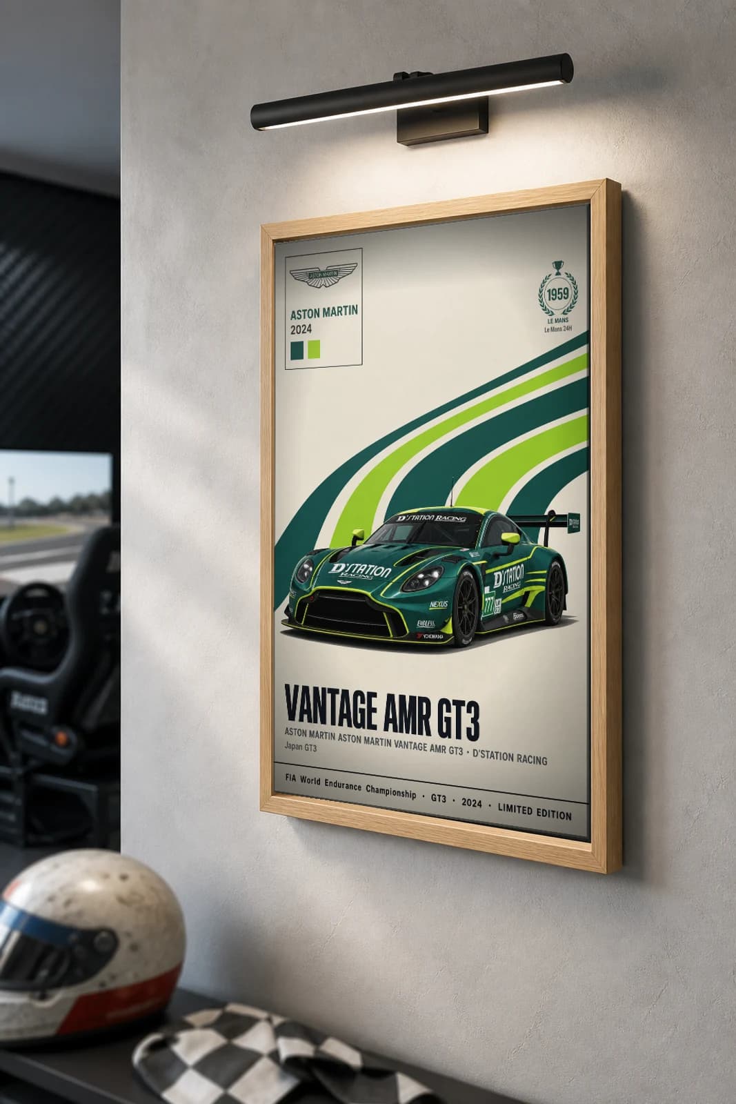 D'Station Racing Vantage AMR GT3 Poster — 2024 LMGT3 WEC racing wall art · #777 · framed A2 — the framed print shown at a three-quarter angle on a styled gallery wall in a natural-oak frame
