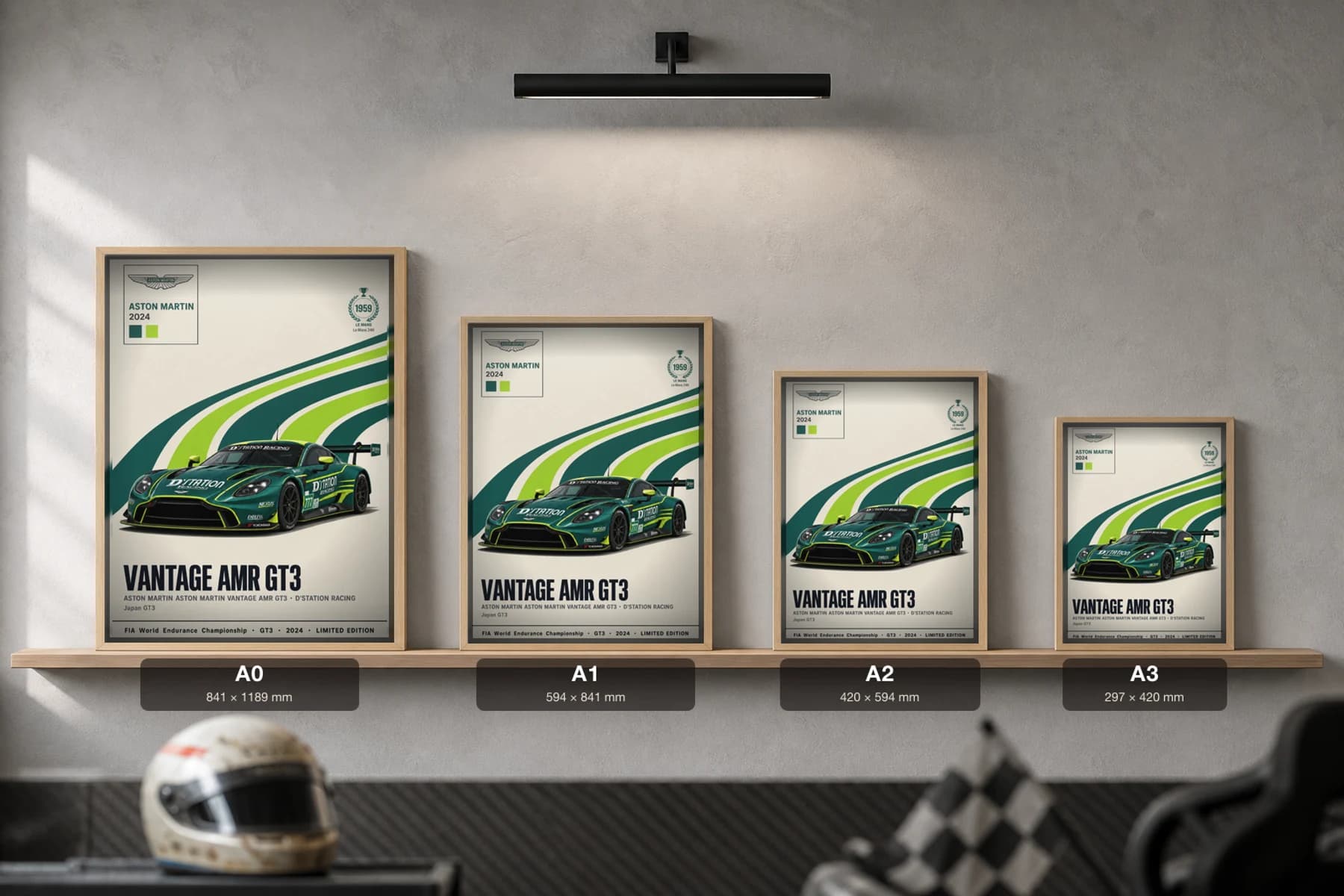 D'Station Racing Vantage AMR GT3 Poster — 2024 LMGT3 WEC racing wall art · #777 · framed A2 — print size guide showing the artwork at A0, A1, A2 and A3 in natural-oak frames at true relative scale
