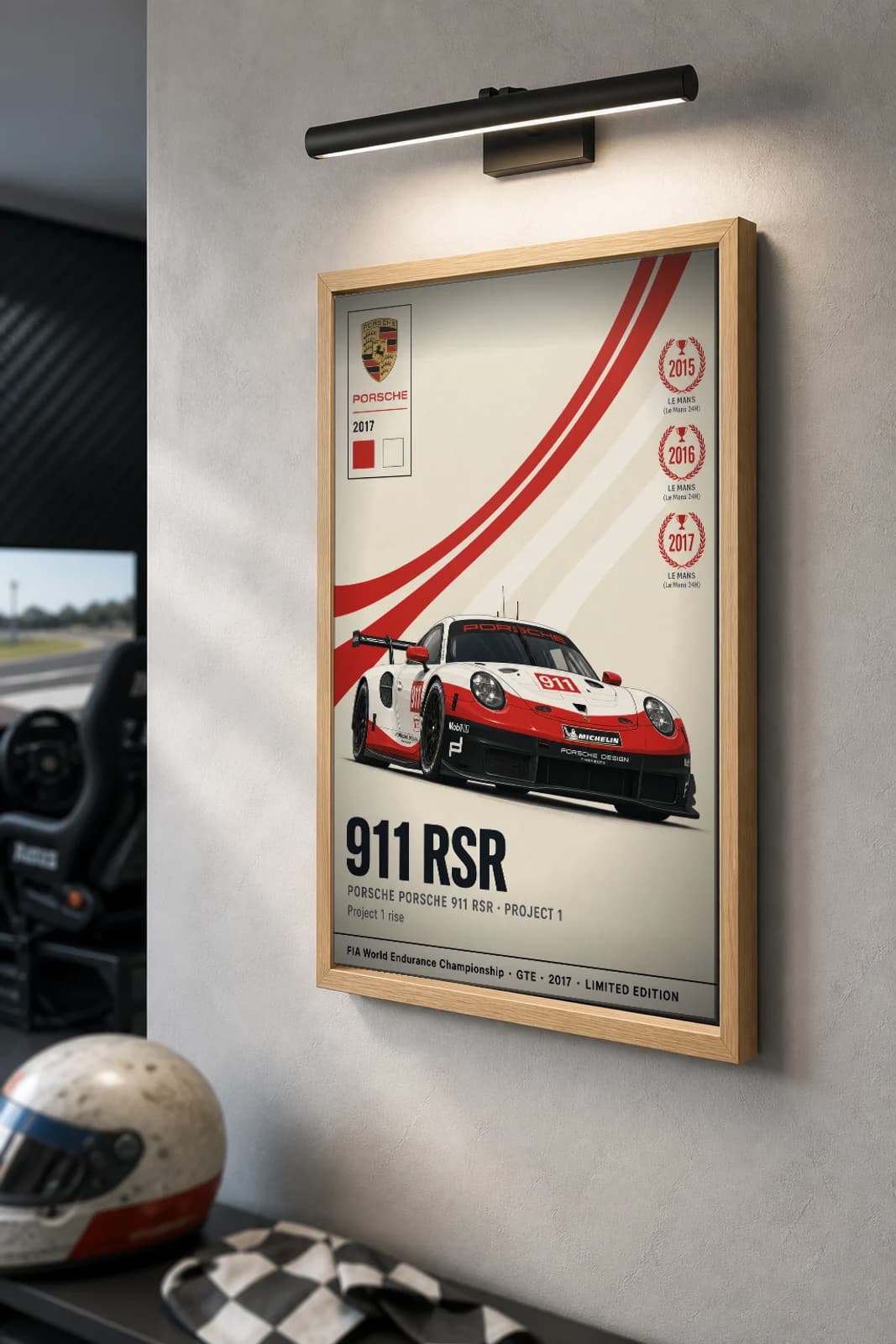 Project 1 991 RSR Poster — 2017 GTE WEC racing wall art · #— · framed A2 — the framed print shown at a three-quarter angle on a styled gallery wall in a natural-oak frame