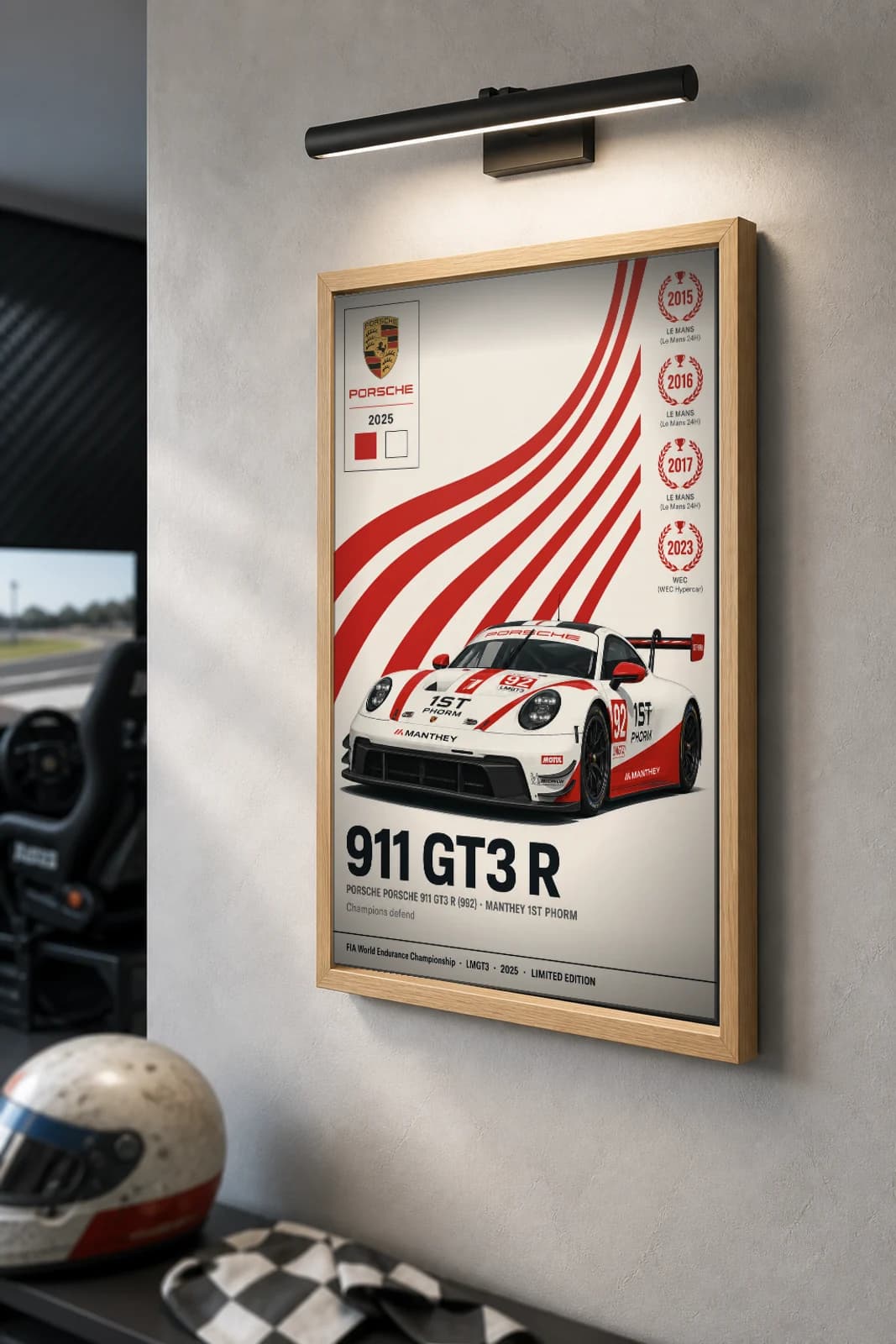 Manthey Racing / 1st Phorm 911 GT3 R (992) Poster — 2025 LMGT3 WEC racing wall art · #92 · framed A2 — the framed print shown at a three-quarter angle on a styled gallery wall in a natural-oak frame