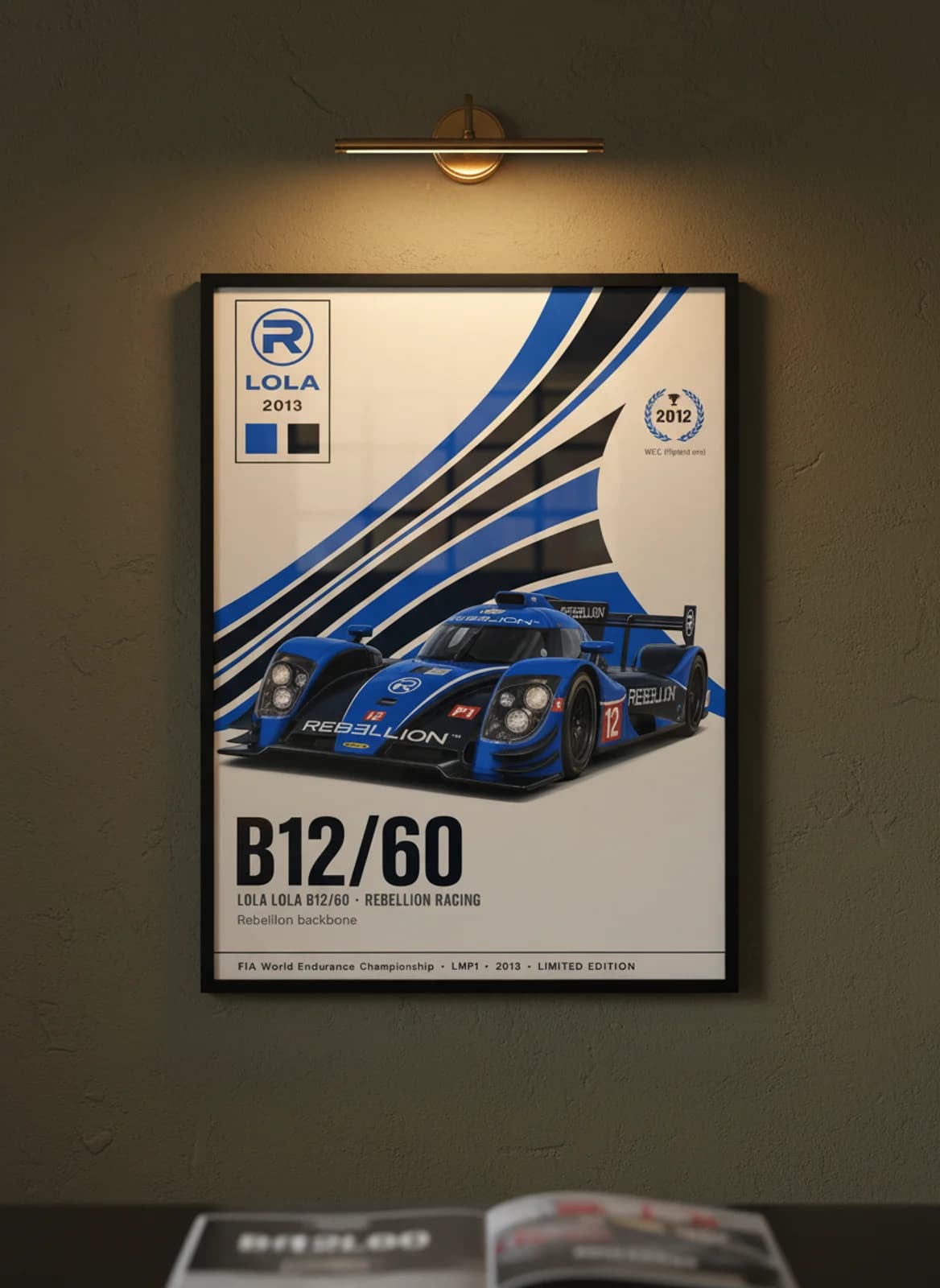 B12/60 — Rebellion #12 WEC Masters endurance print in black A2 frame on royal-blue olive wall — WEC Masters mockup