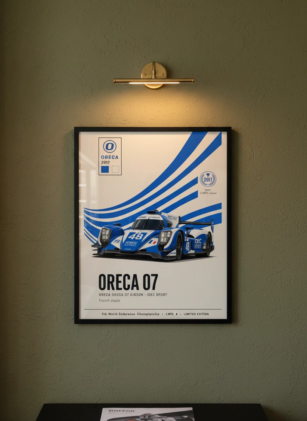 ORECA 07 WEC Masters endurance print in black A2 frame on royal-blue olive wall — WEC Masters mockup